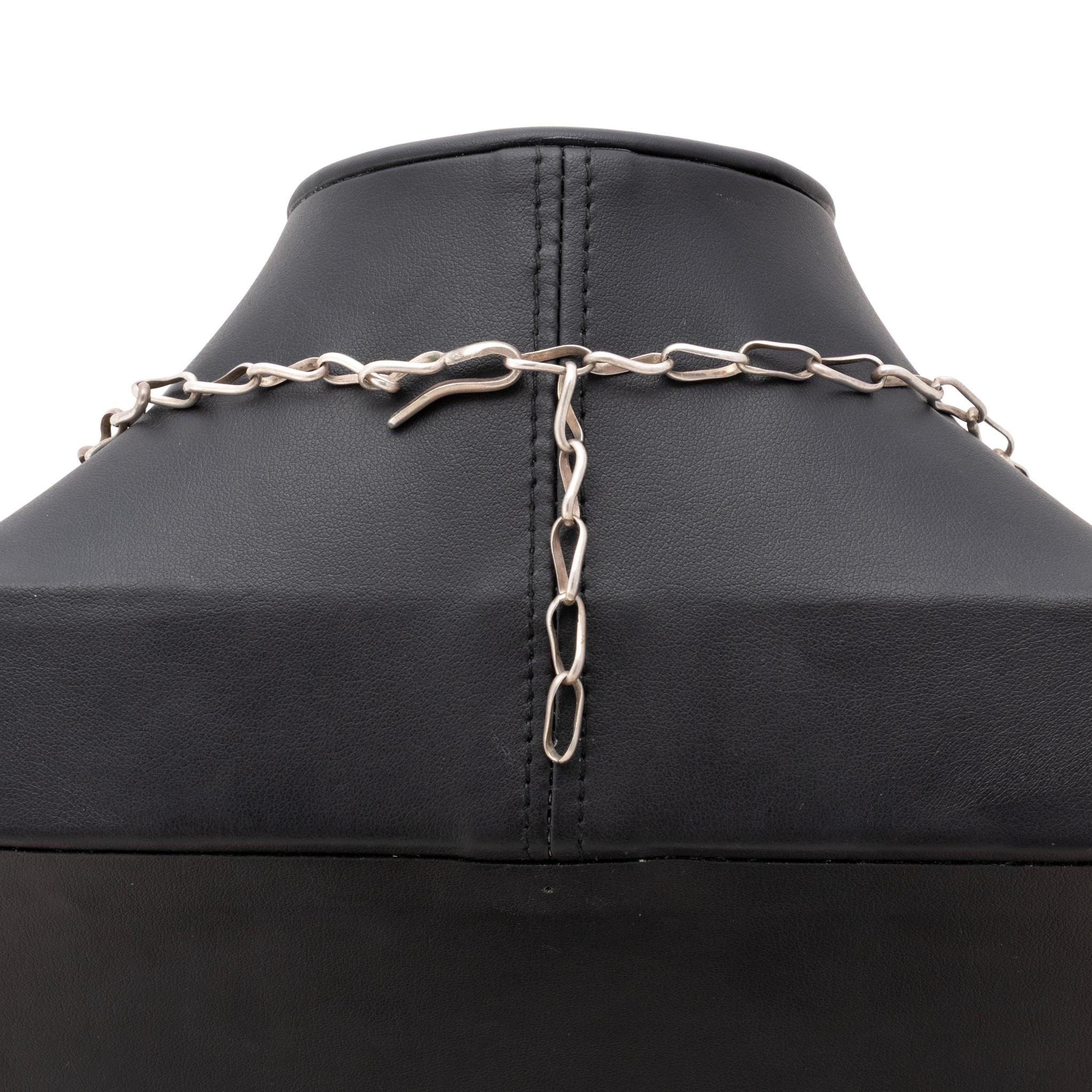 Navajo sterling silver and Kingman turquoise feather link necklace. Signed by Navajo artist Bernyse Chavez and stamped 