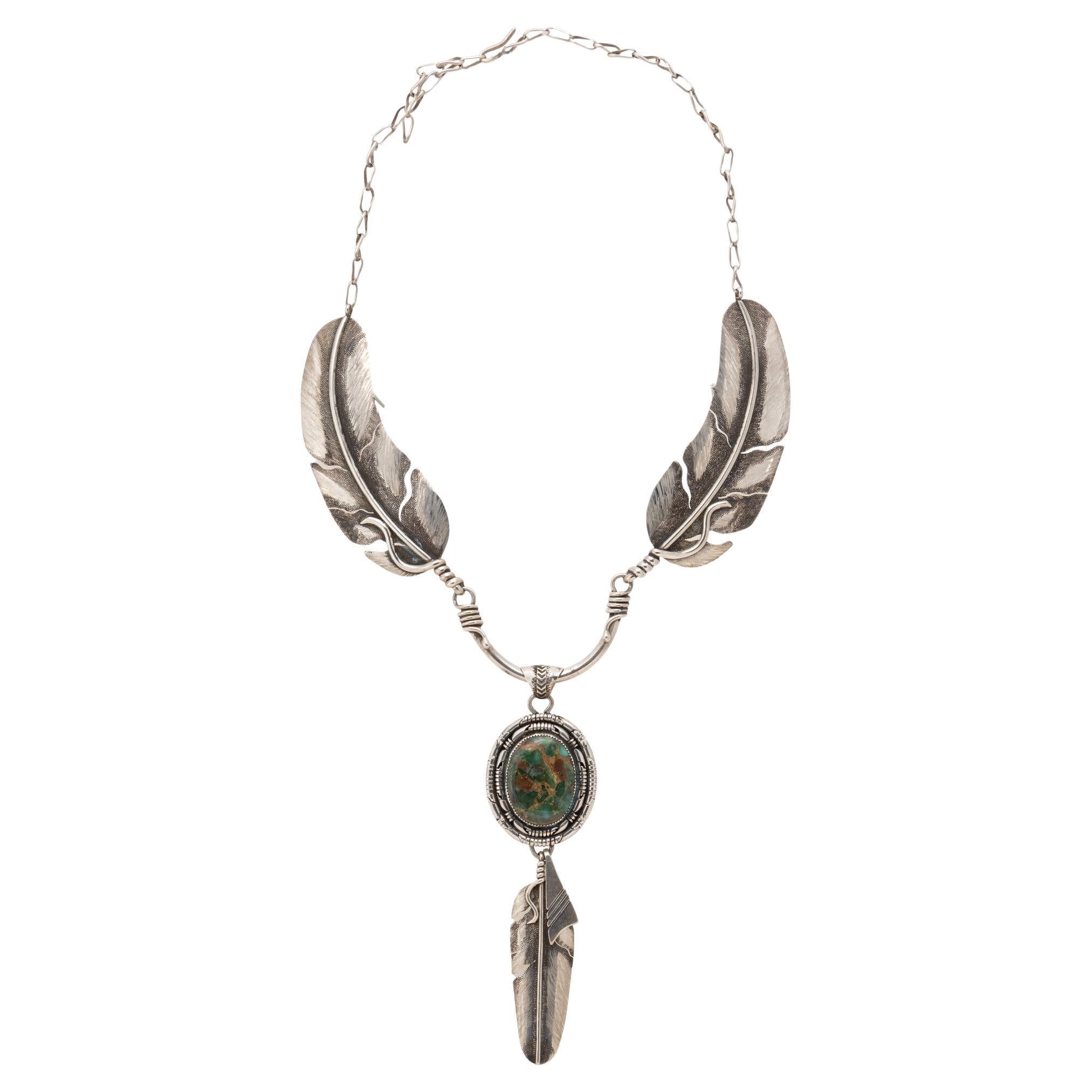 Collana Navajo in argento sterling con piume e turchese