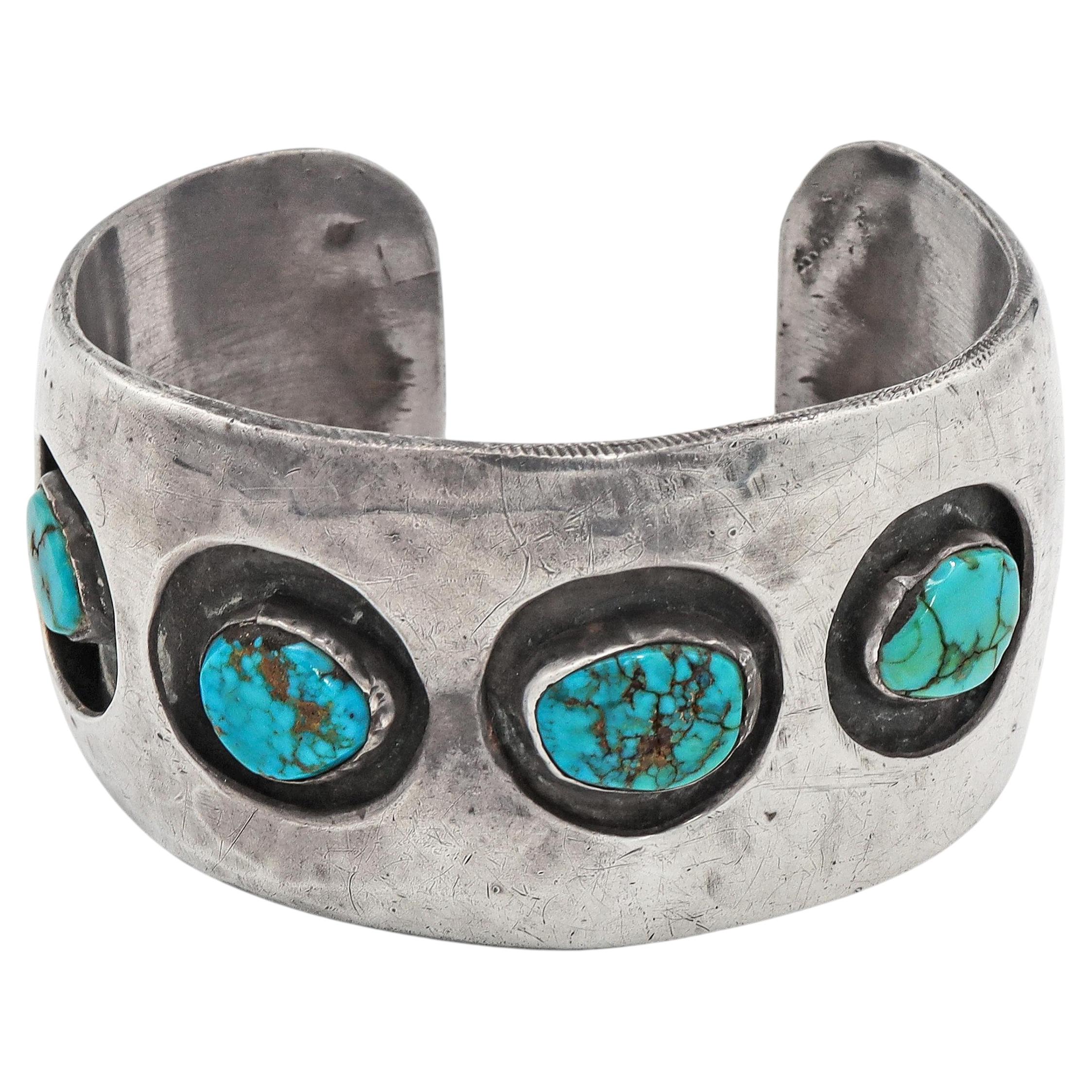 Bracciale a polsino Navajo in argento sterling con quattro turchesi