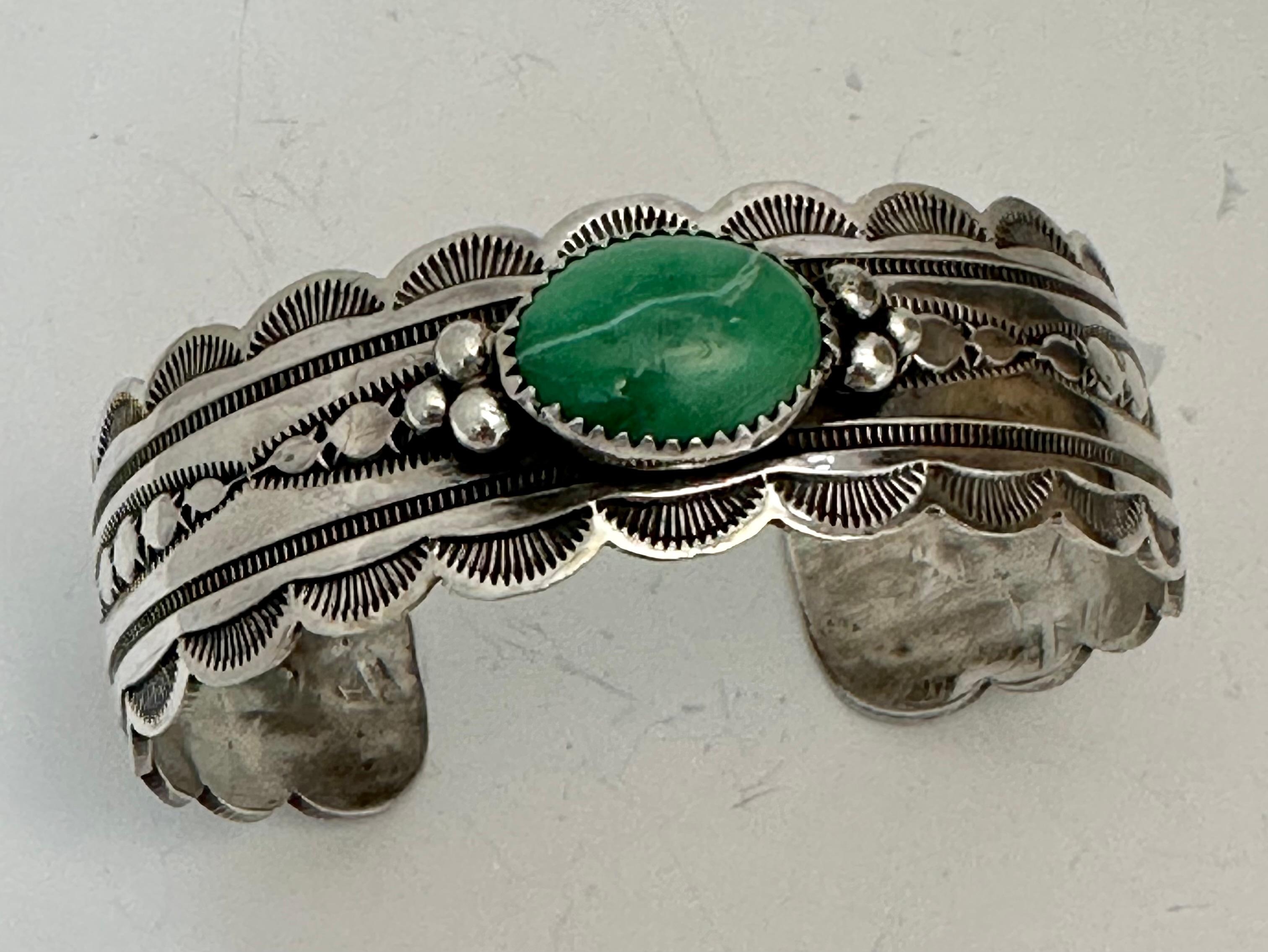 Sterling Silver .925  Cerrillos Mountain Turquoise Cuff Bracelet by Navajo Artist T.T.
Measures approximately: 
20mm wide
2 1/2