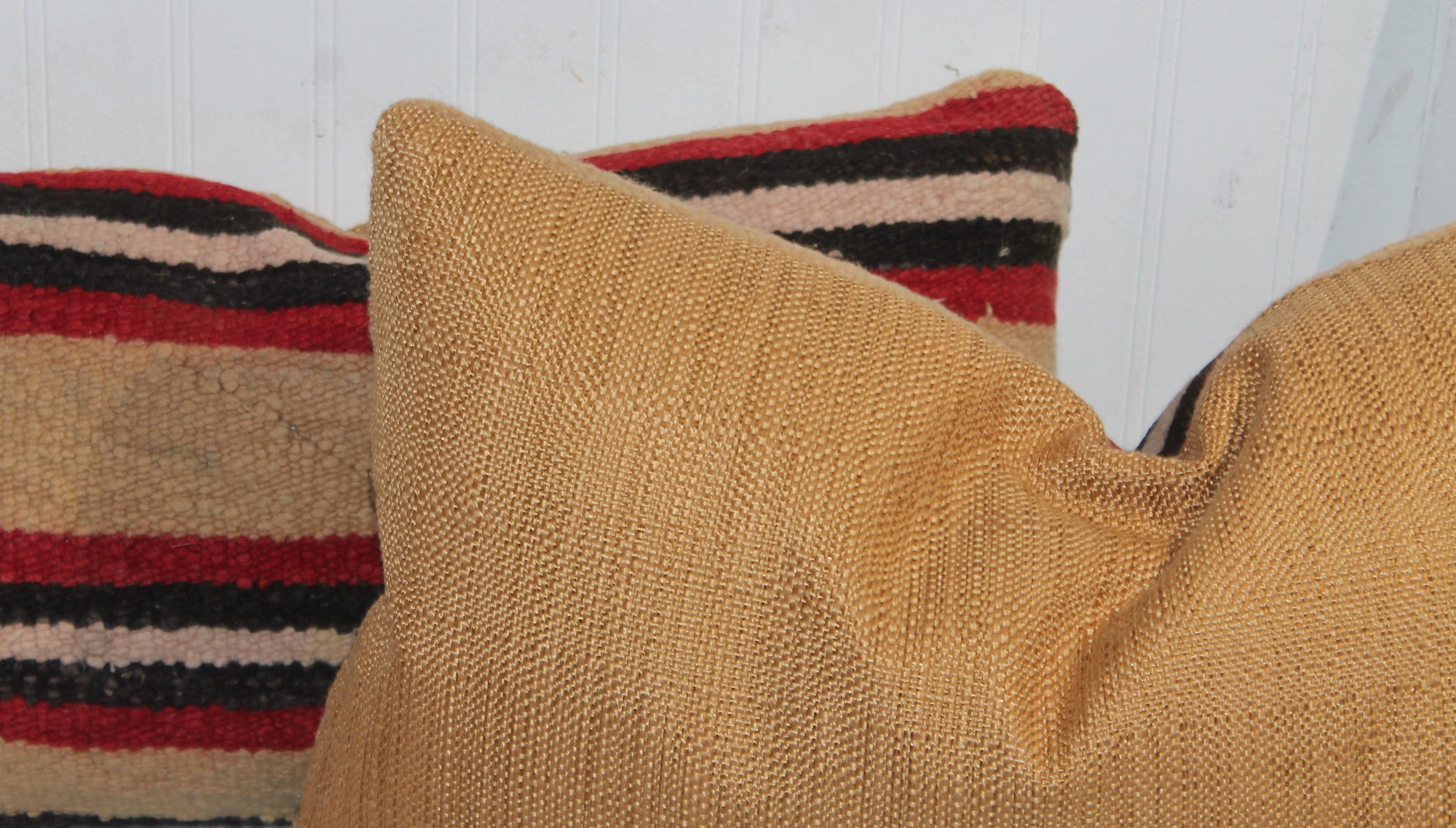 Pair of Navajo Striped Kidney Pillows in a striped pattern. Great thicker wool with linen backing. Great with any modern, Country or Adirondack setting.