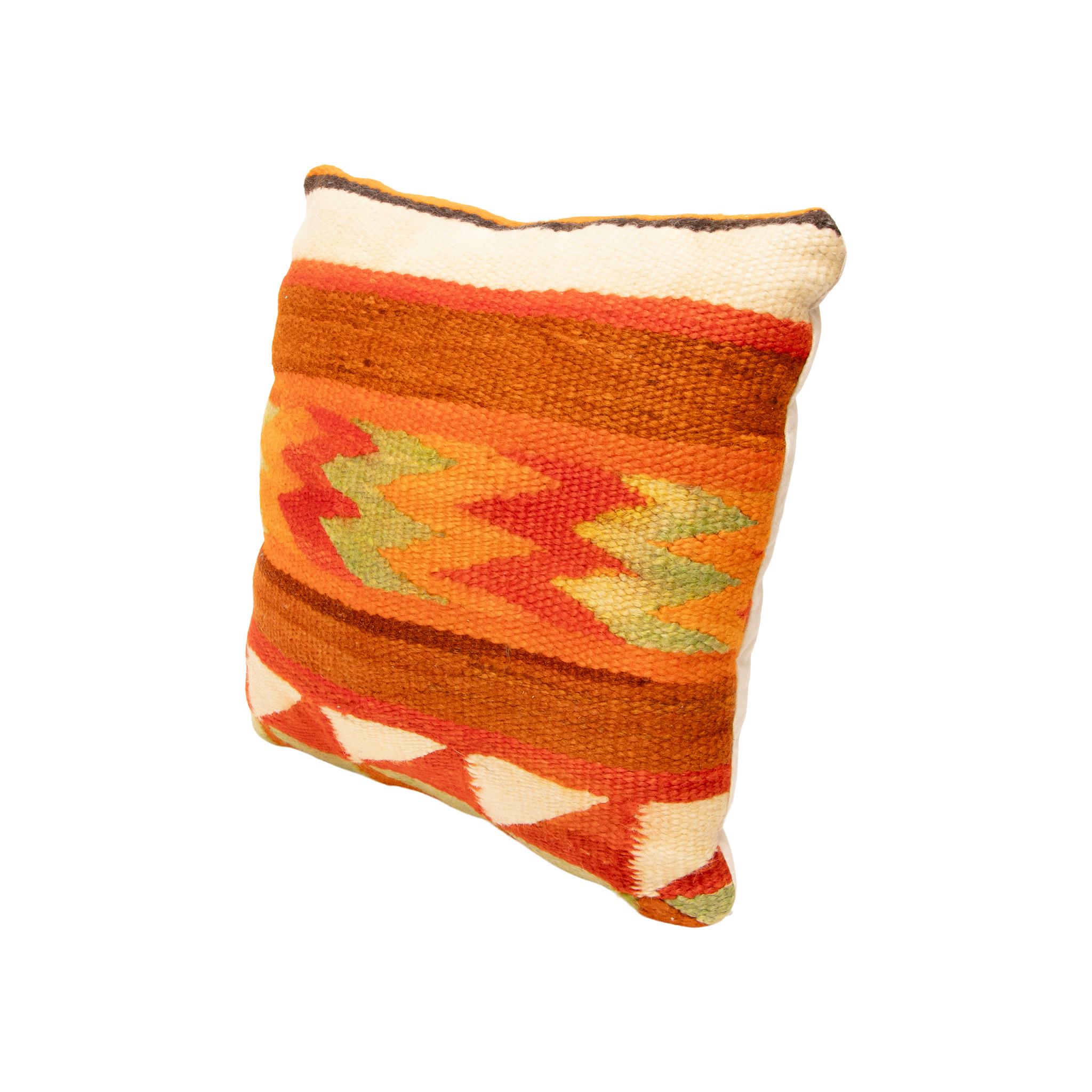 Navajo transitional pillow. Handmade pillow with front made of Navajo 1880's transitional weaving. Backed with canvas. Featuring natural dyed colors of cream, red, brown, green, and orange. Beautiful accent pillow that would complement any