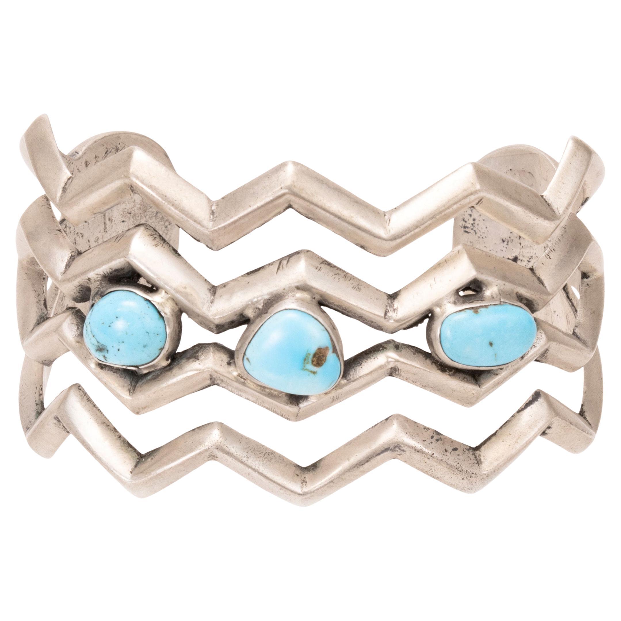 Bracciale con turchese Navajo e argento fuso con sabbia in vendita