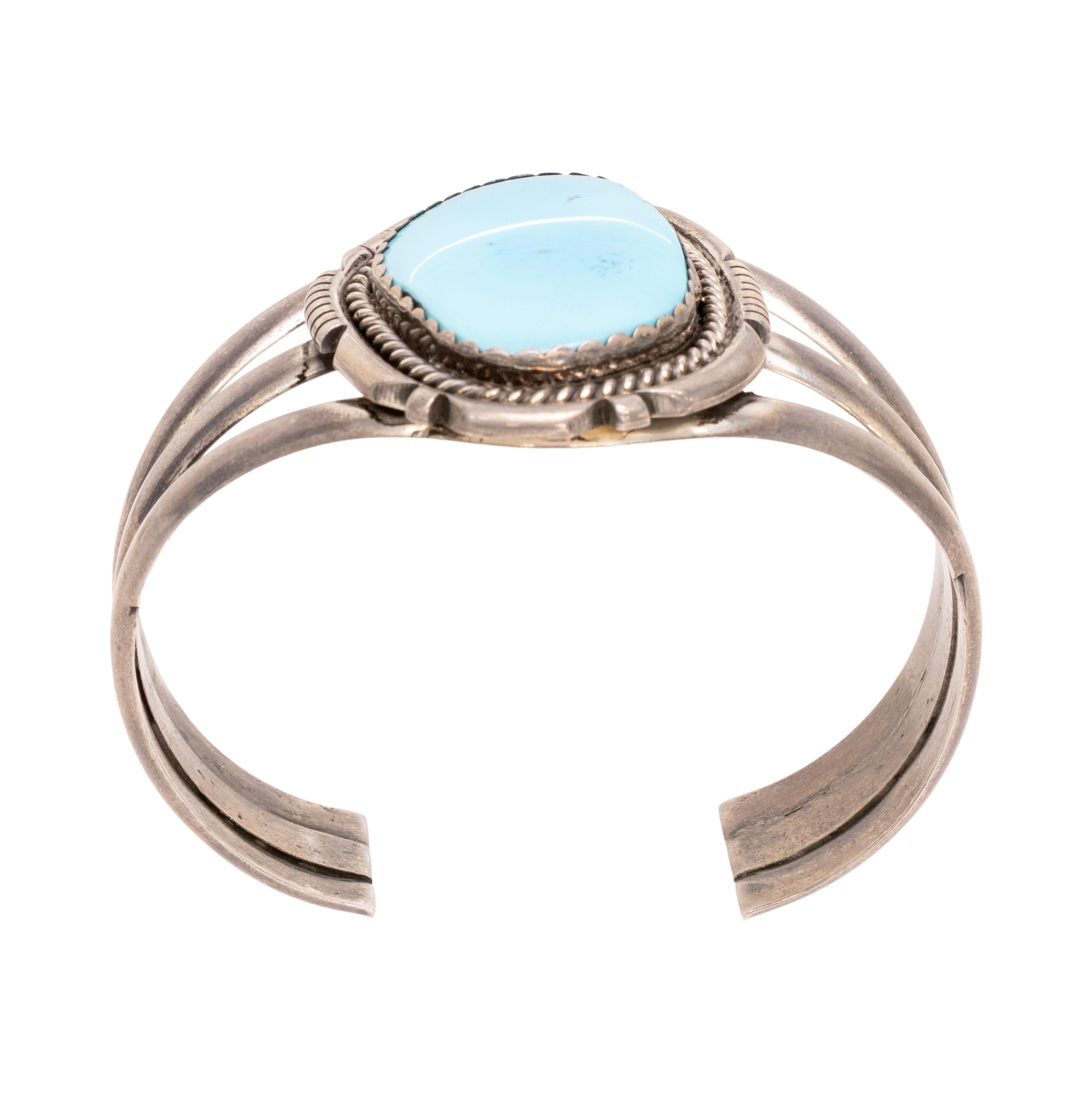 Navajo single slab turquoise bracelet, with twisted metal rope band circling the slab. Absolutely beautiful 2 1/4