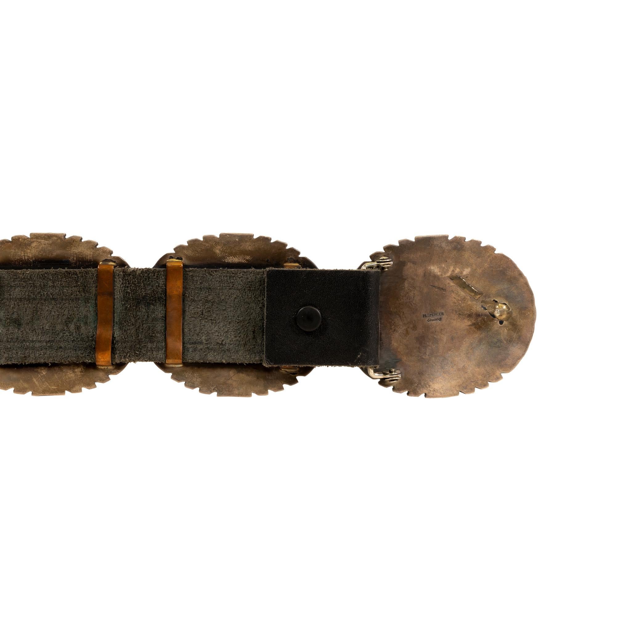 Navajo turquoise and sterling silver concho belt. Featuring eleven large conchos with natural, untreated Morenci turquoise, expertly cut to organically fit in each concho. Stones are in smooth bezel setting with sterling bead decoration. Each concho