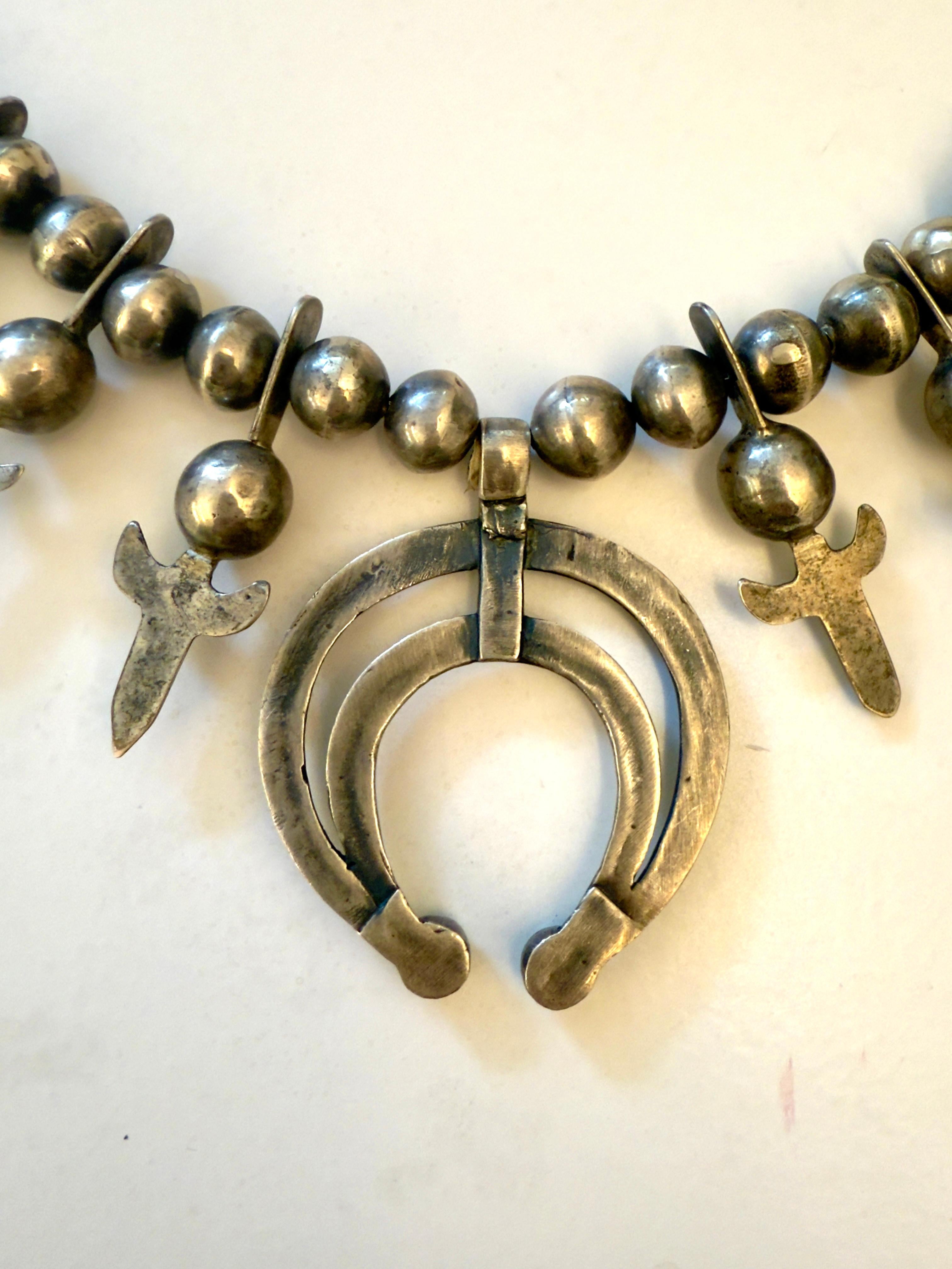 Native American Navajo Turquoise and Sterling Silver Squash Blossom Necklace circa 1940 For Sale