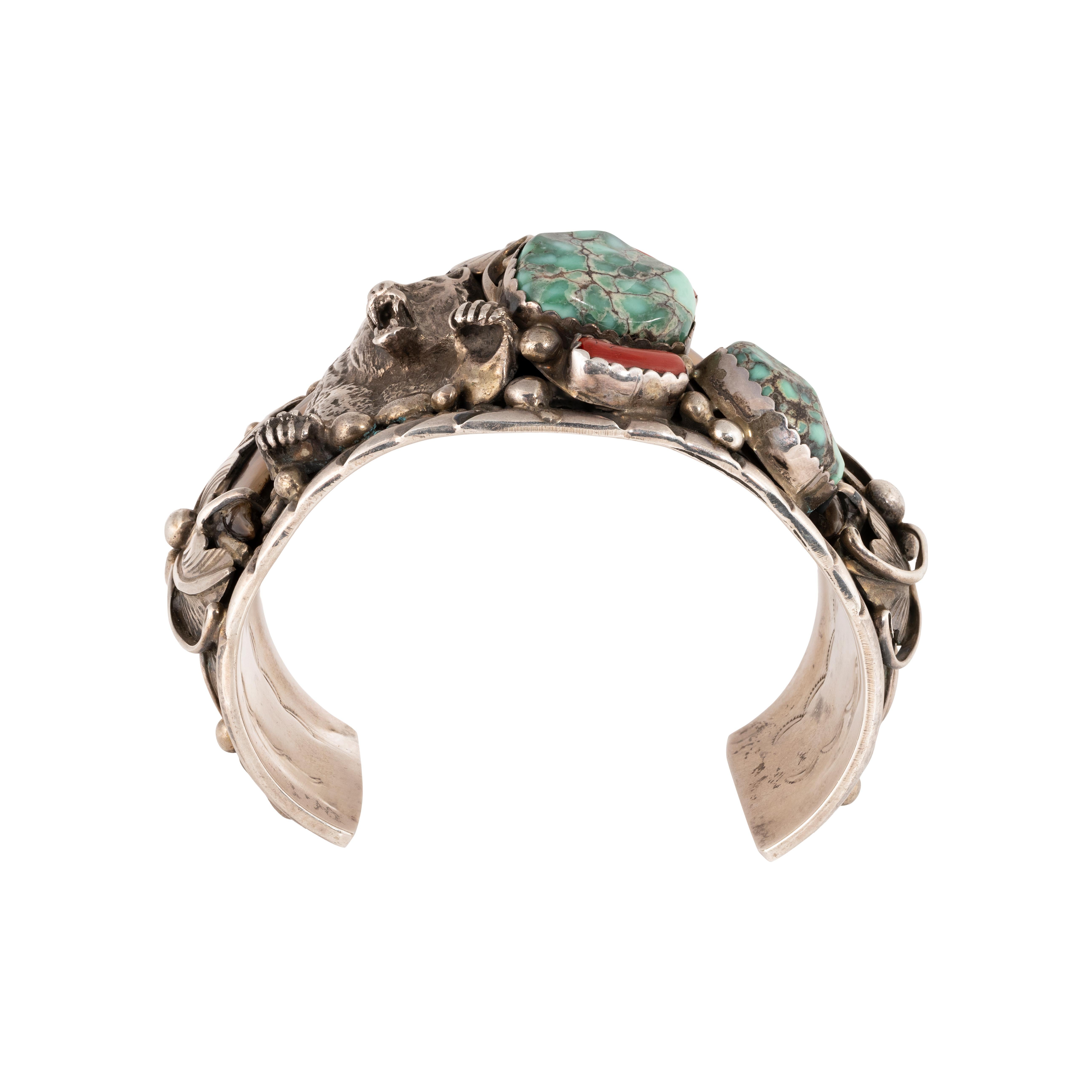 Navajo Carrio Lake turquoise, coral cuff by Norm Thompson. Stamped 