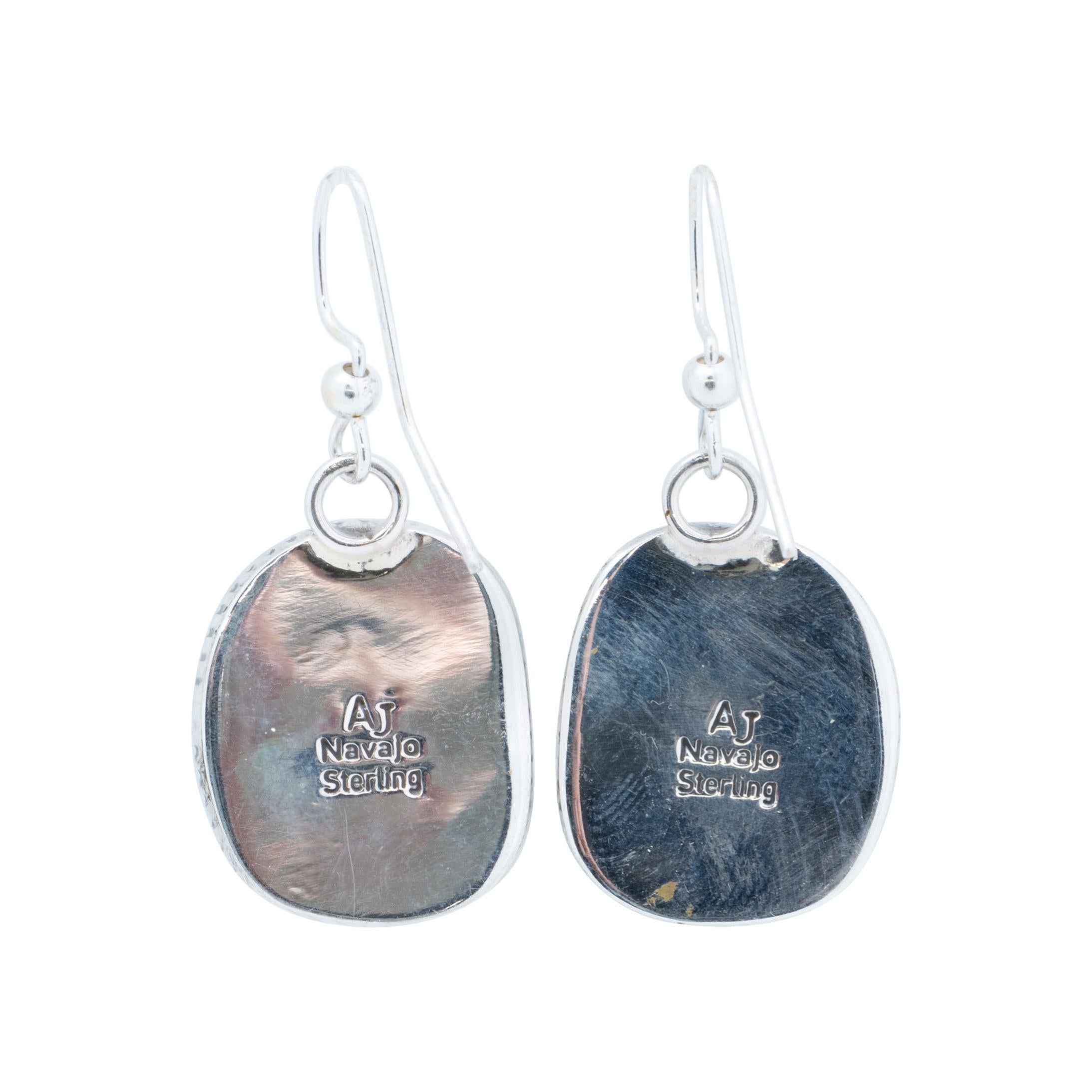 Navajo sterling silver and single-stone Kingman turquoise dangle earrings made by Navajo silversmith Avin Joe. Marked 