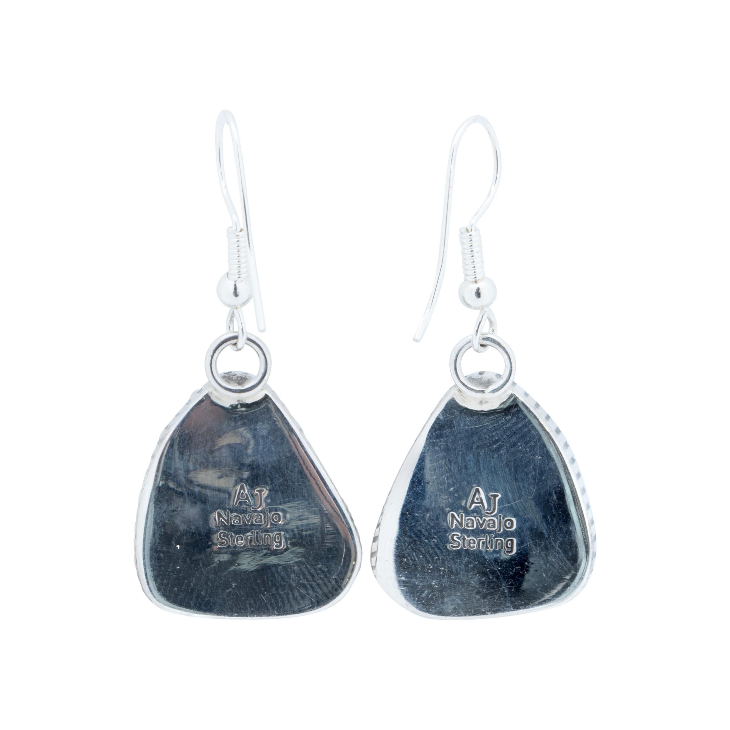 Navajo sterling silver and Kingman single-stone turquoise dangle earrings made by Navajo silversmith Avin Joe. Marked 