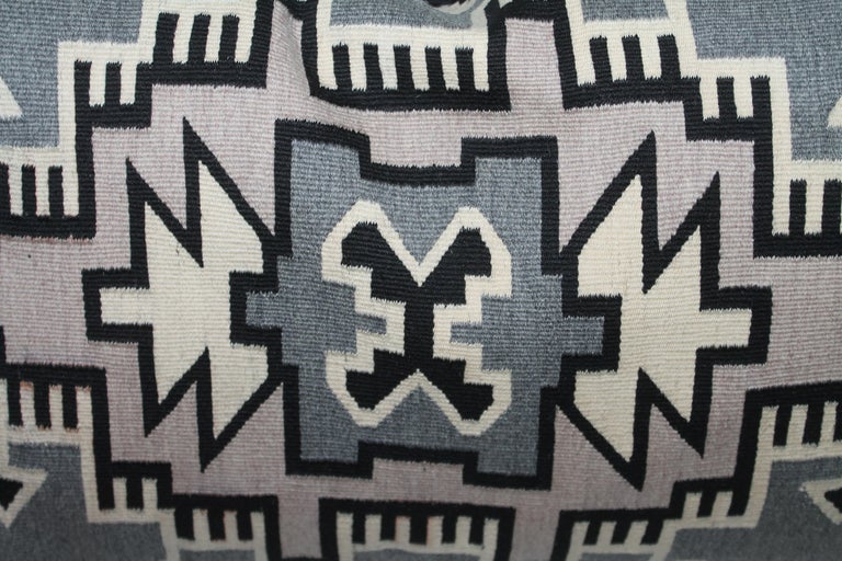 Navajo Indian weaving two grey Hills pillow. The backing is in black cotton linen and down & feather fill.