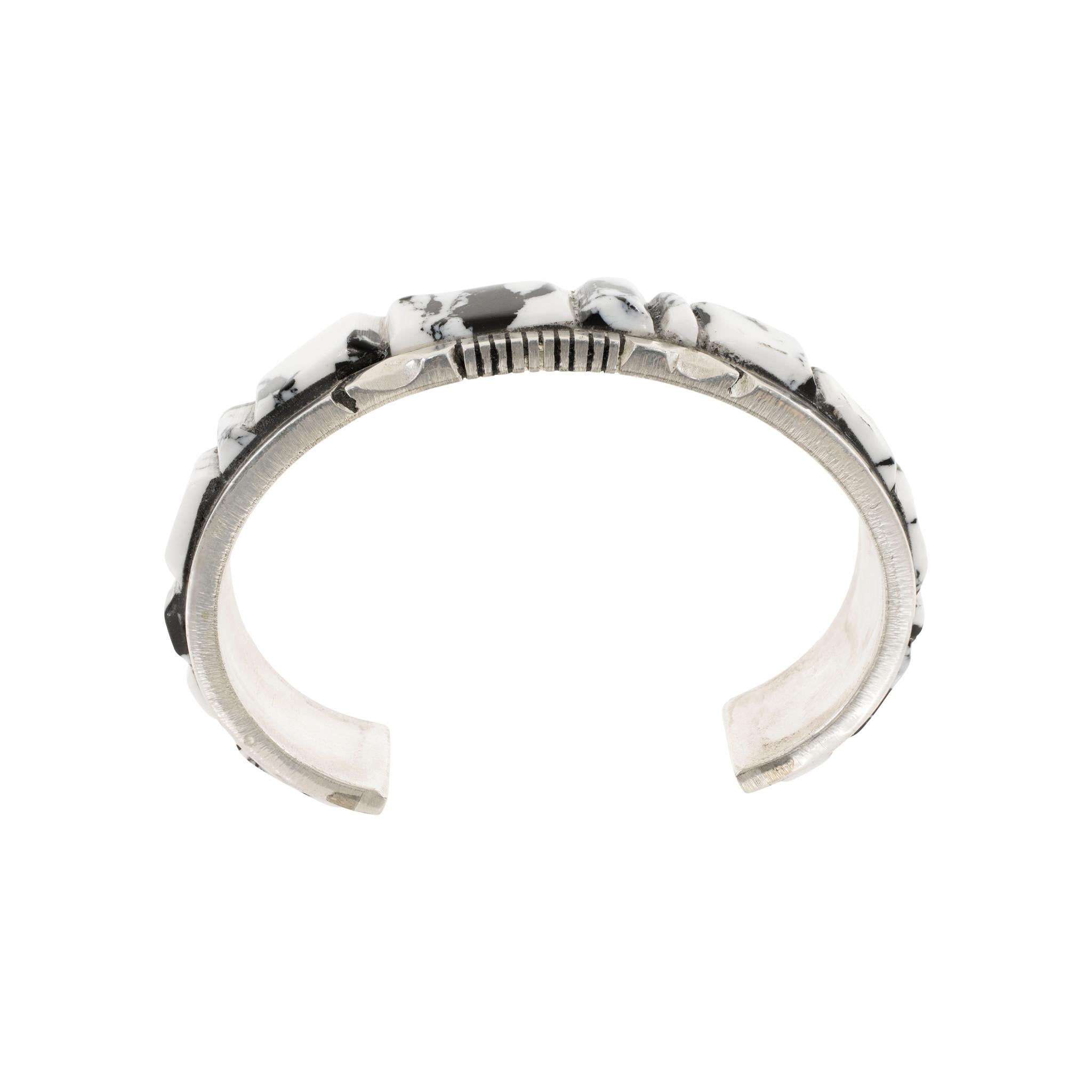 Navajo sterling silver and white buffalo turquoise bracelet by Navajo Silversmith Steve Francisco. Solid sterling with exceptional grade A quality raised stones. Stamped Sterling with maker’s hallmark and initials “SF” on inside of band. Solid and