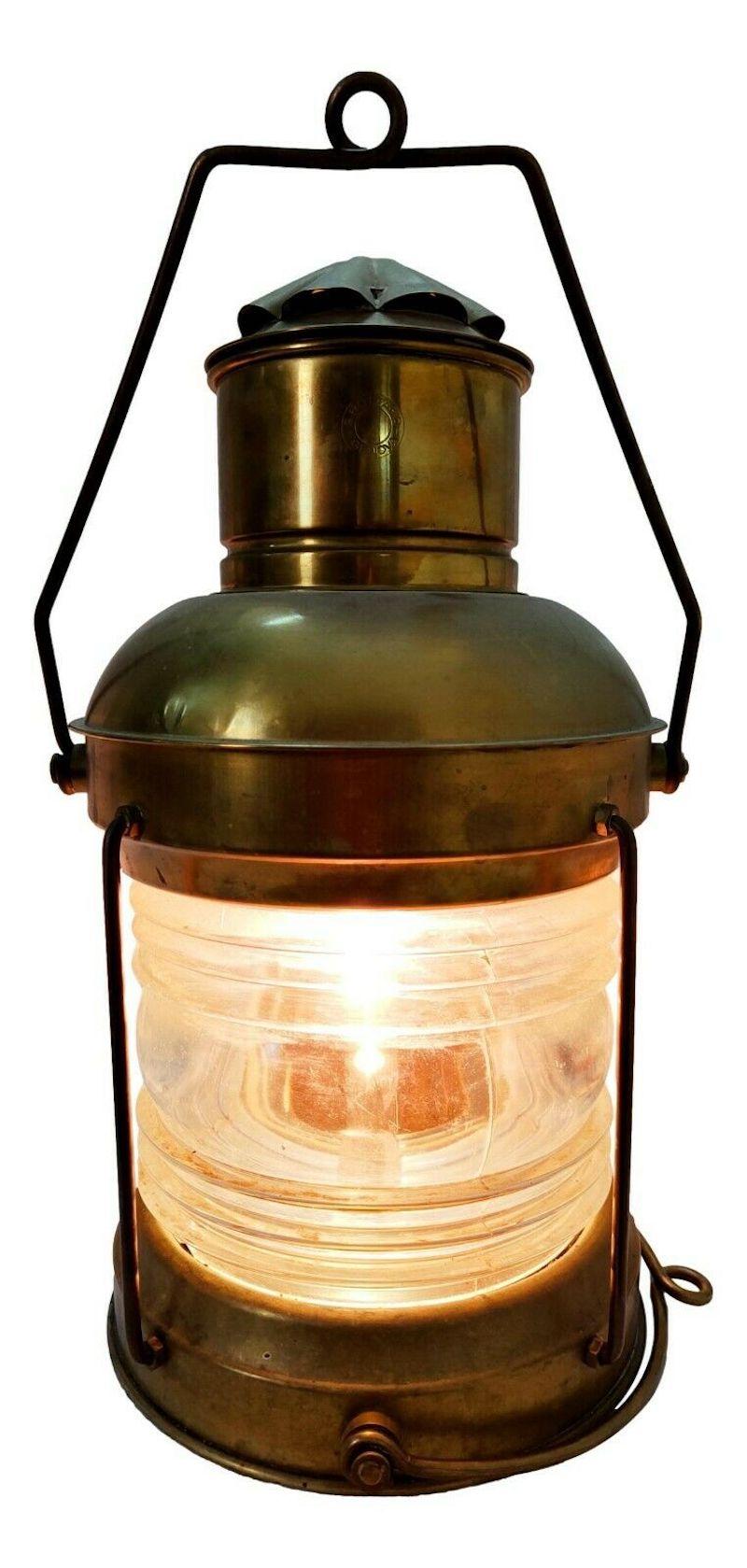 Rare naval lamp, street light, made by Emilio Bottaro by Giuseppe di Genova, early 1940s

Well preserved and electrified, fully functional, it can be used both as a table lamp and as a hanging lamp

Made of brass and worked glass, it measures 50