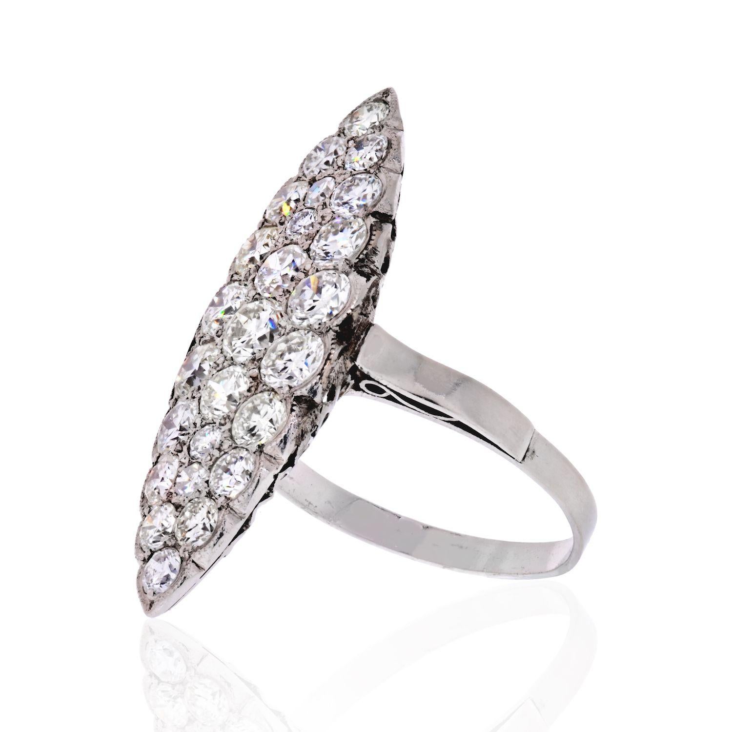 Navette Platinum 3.75 Carat Round Cut Diamond Ring
Set with 25 old-European cut diamonds. 
L: 32mm
W: 12mm
Size: 7.5
Sits flat on the finger with a delicate ajour under carriage. 