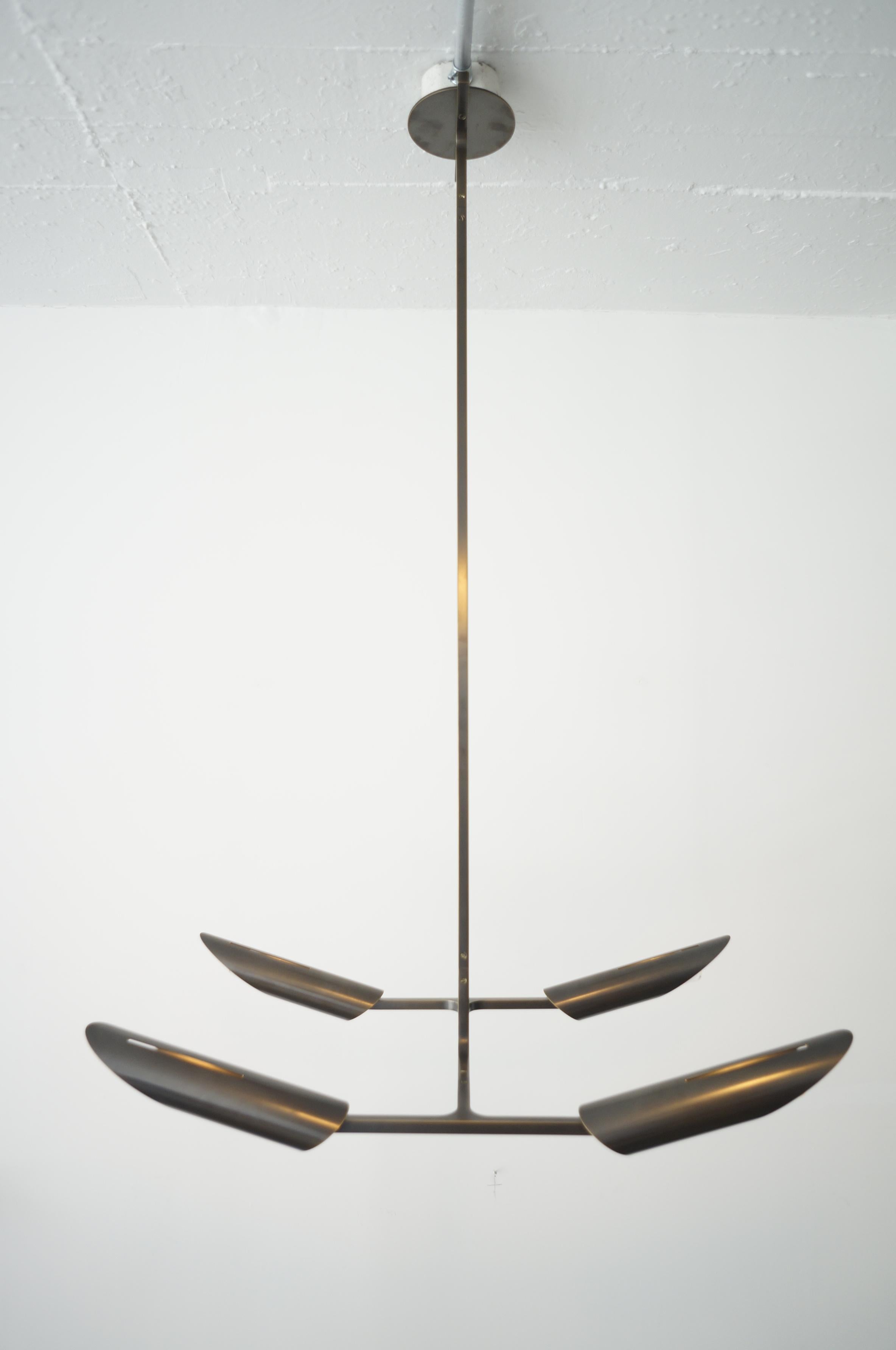 Showroom floor model. List price shown is after the applied 20% floor model discount for this piece

Navis, a figurative extension of the Latin word for ship or vessel, influenced the sleek design of this lighting collection. Propeller design and