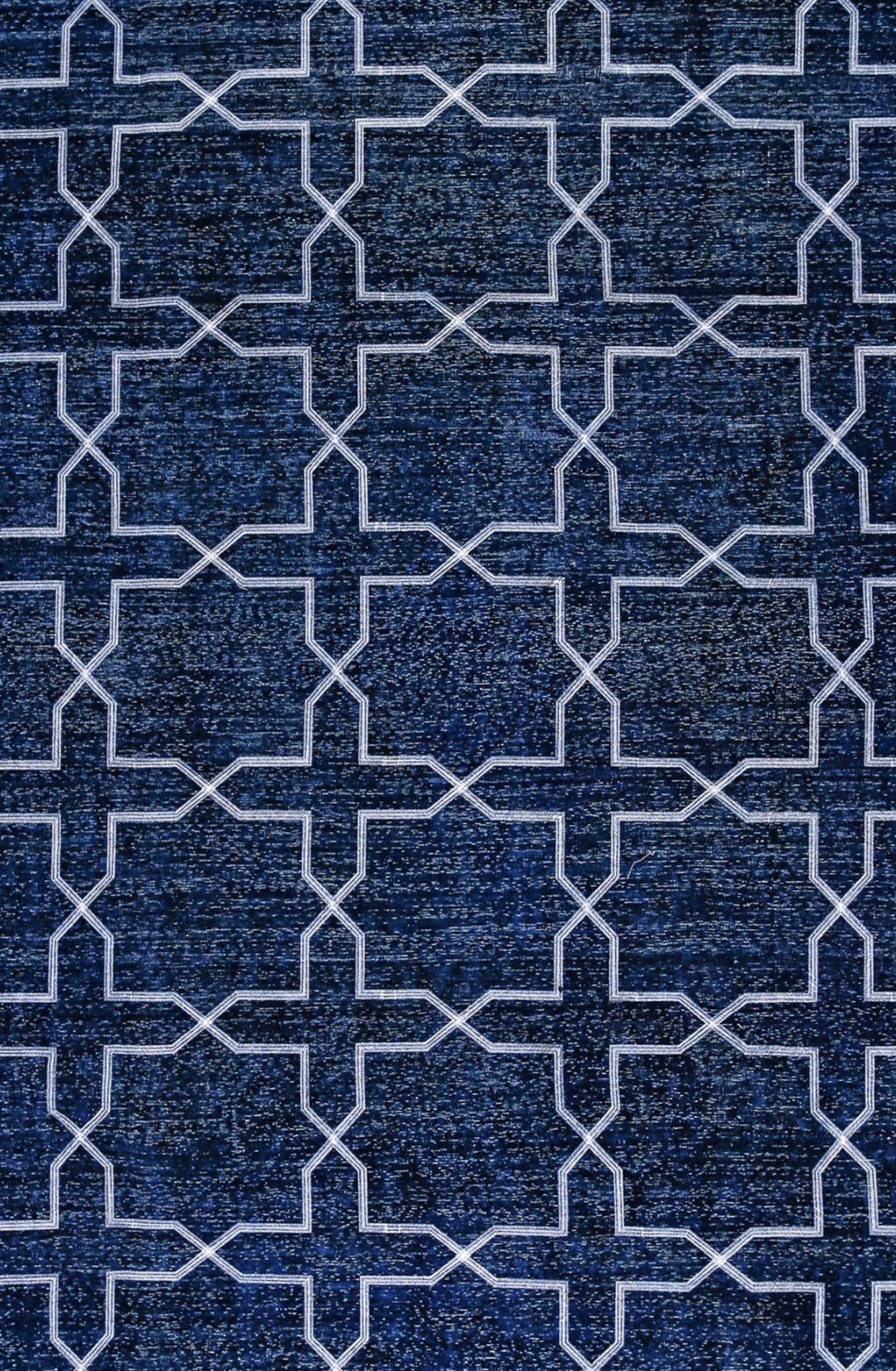 This is a fine example of an Overdyed area rug. These rugs demonstrate a process best described as 'The modern palette applied to classics'. It consists of an added step to the finishing process in which the rug is antique washed, sheared, and