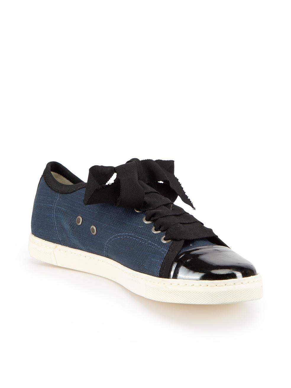 CONDITION is Very Good. Minimal wear to shoes is evident. Minimal wear and discolouration of rubber outsole as well as mild tarnishing of eyelets on this used Lanvin designer resale item.





Details


Navy & black

Cloth

Trainers

Flat