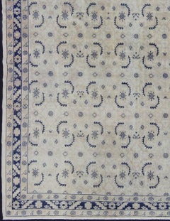 Vintage Turkish Oushak Rug in Pale Ivory and Indigo with Repeating Motifs