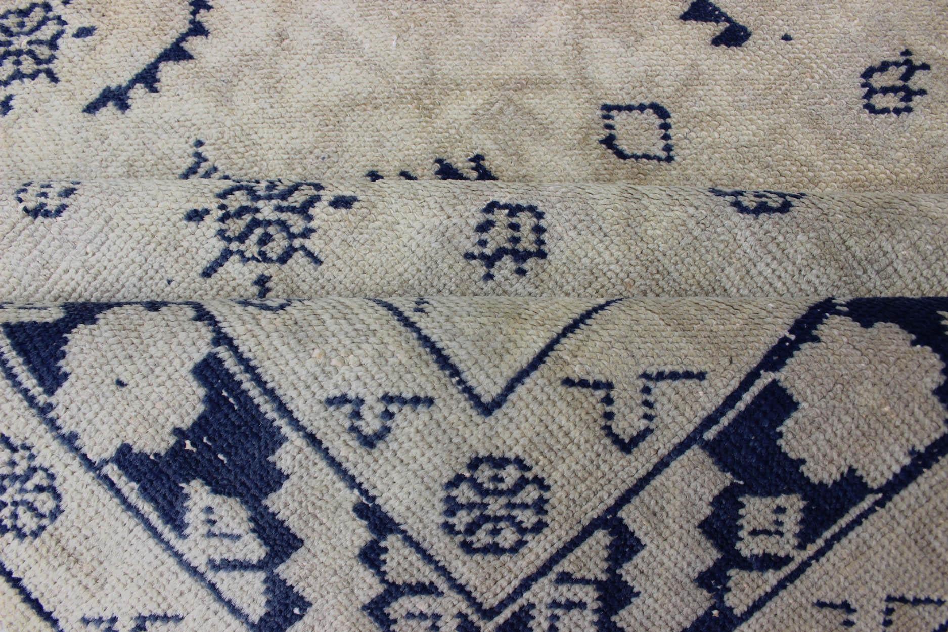 Mid-20th Century Navy Blue and Ivory All over Design Vintage Turkish Oushak Rug For Sale