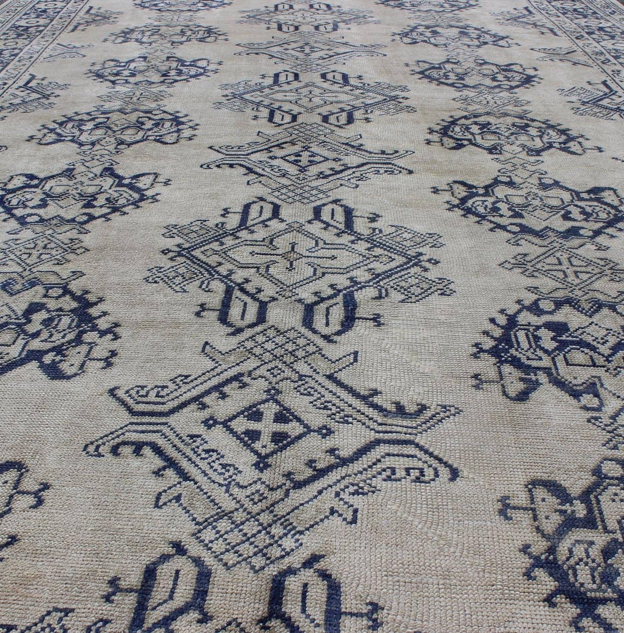 Wool Navy Blue and Ivory Antique Turkish Oushak Rug with Vertical Geometric Design For Sale