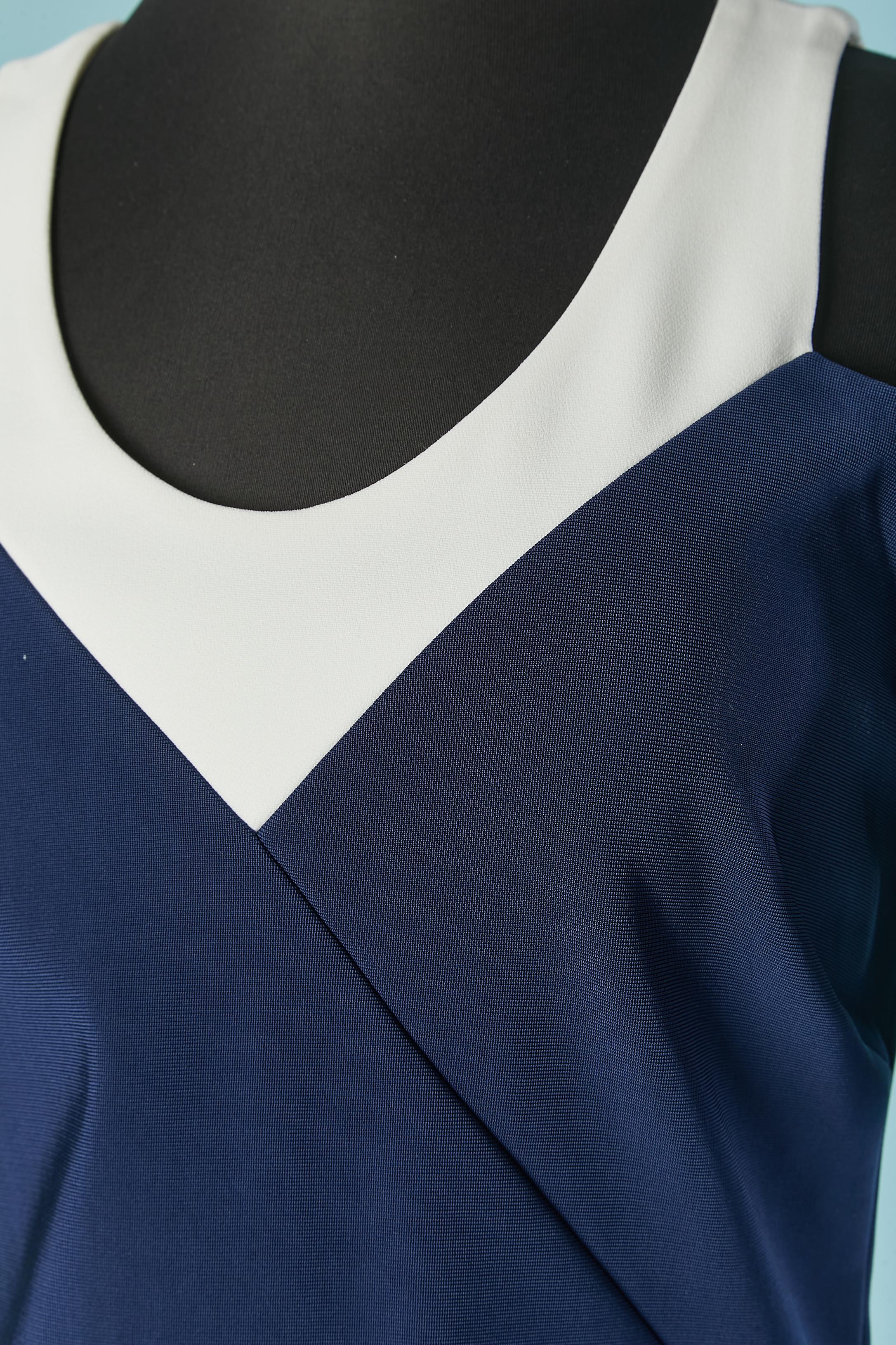 Navy blue and white dress with opening on the shoulders. 
Fabric composition 1: 86% rayon, 10% polyamide, 4% elastane. Fabric composition 2 : 52% acetate, 45% rayon, 3% elastane. 
Zip closure and hook&eye on the middle back. 
SIZE 38 (Fr) M 