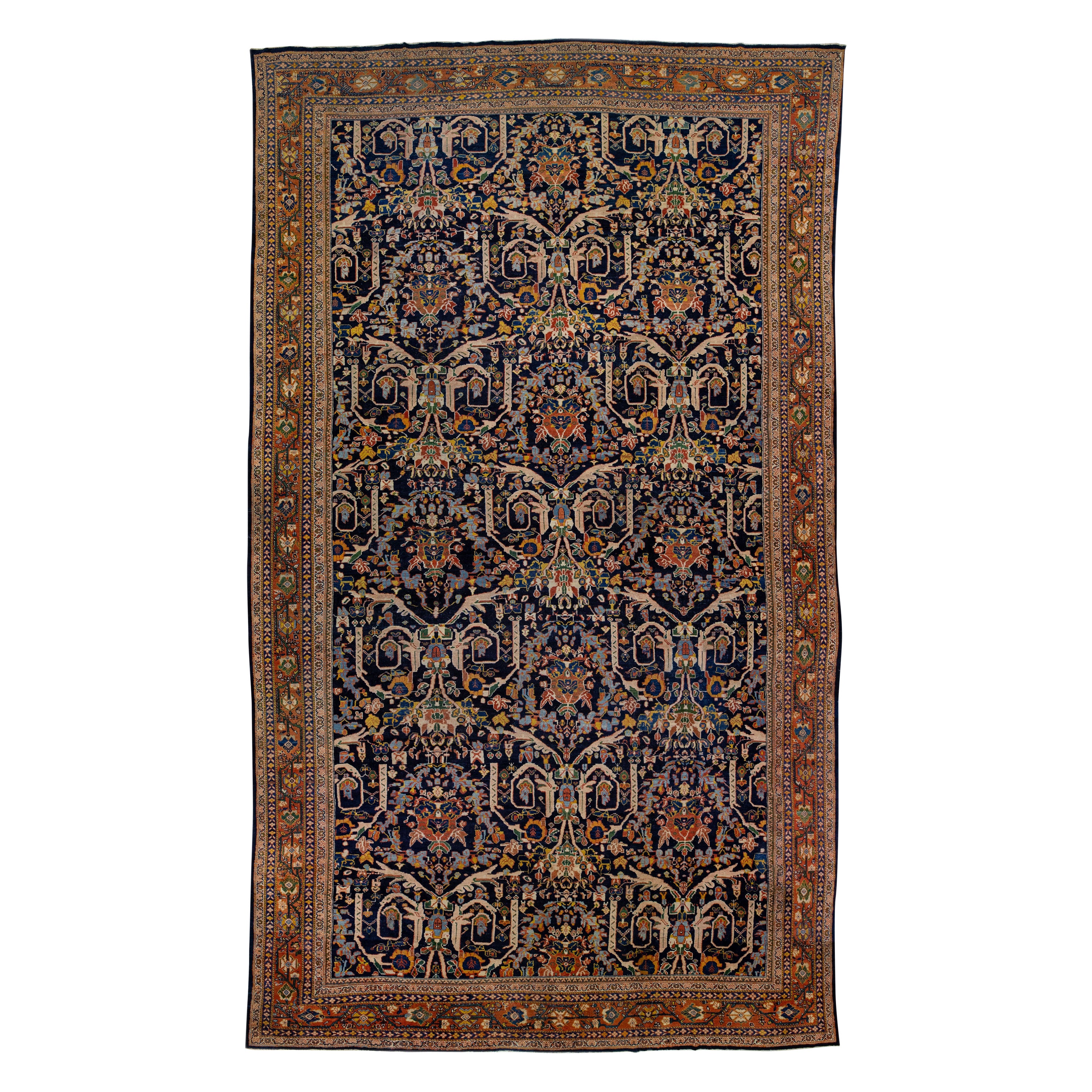 Tapis persan ancien Mahal bleu marine en laine fait à la main avec motif floral