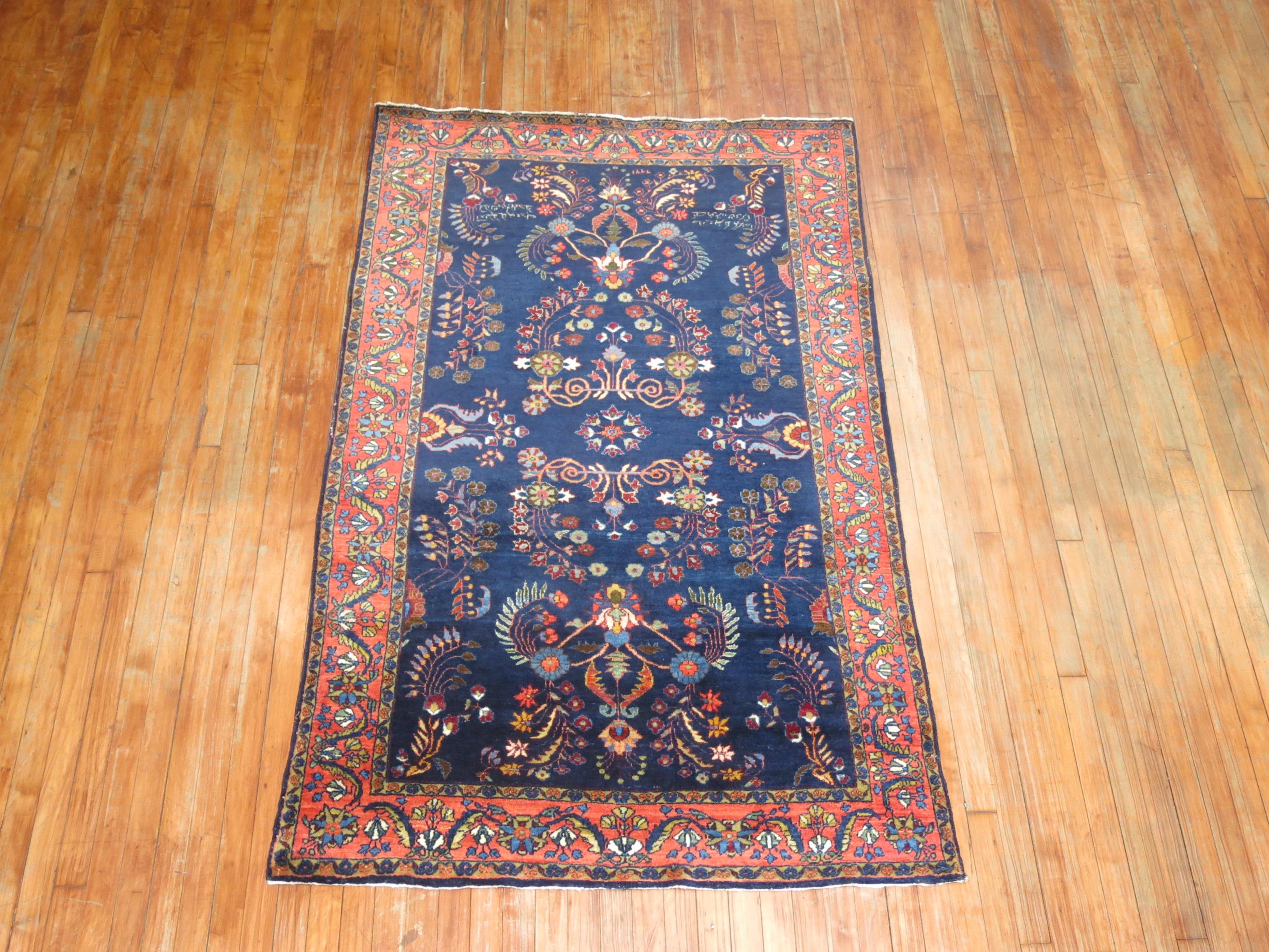 20th Century Navy Blue Antique Persian Sarouk Rug For Sale