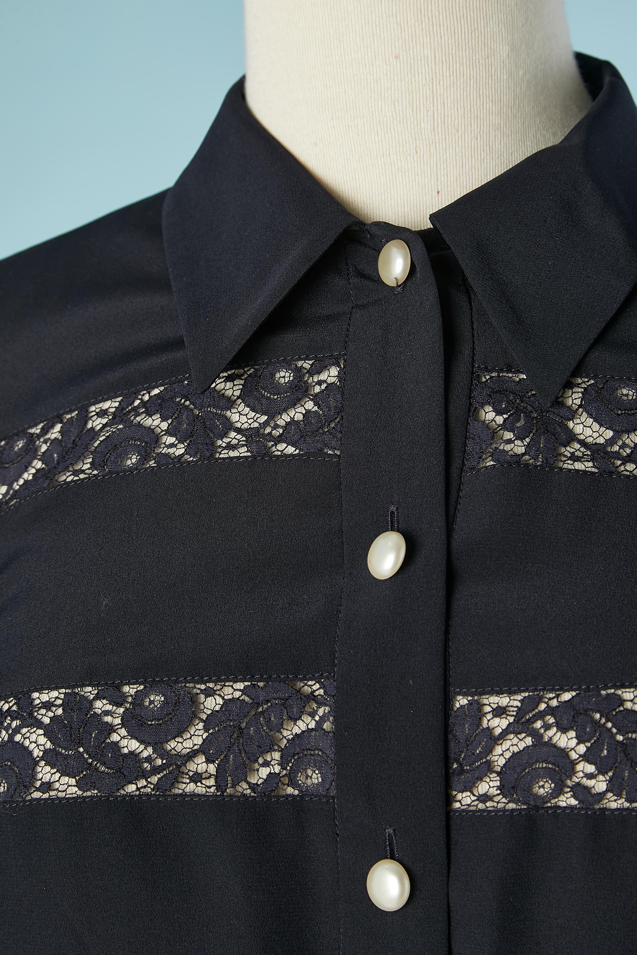 Navy blue blouse with see-through lace insert and mother-of-pearl buttons. 
SIZE 42 It / 38 Fr/ 8 US