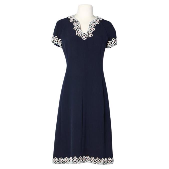 Navy blue cocktail dress with beaded neckline and sleeves Circa 1960's  For Sale