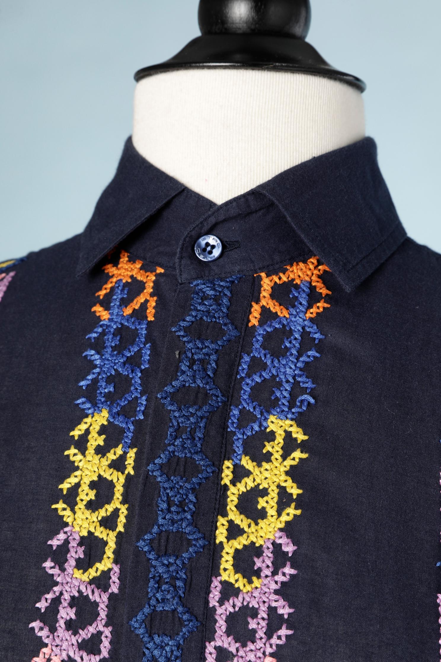 Navy blue cotton shirt with multicolor cotton threads embroideries . 
SIZE L 