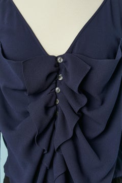 Navy blue dress with ruffle jabot and wool ribs around the hips John Galliano