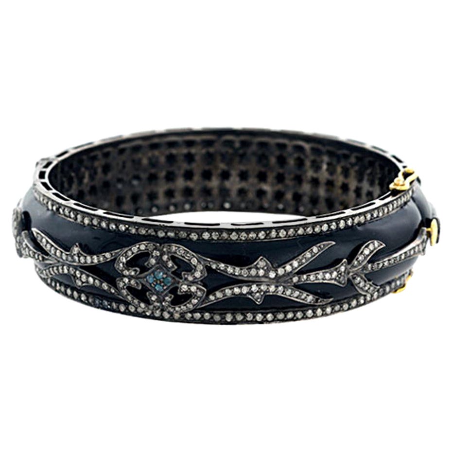 Bracelet jonc en or et argent 18 carats, émail bleu marine et diamants pavés en vente