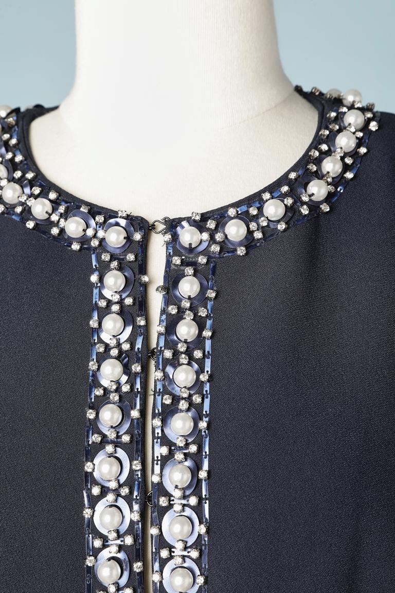 Navy blue evening jacket with beads and rhinestone edge. Edge to edge. 
SIZE: 44(It) 40(Fr) 10 (Us) 