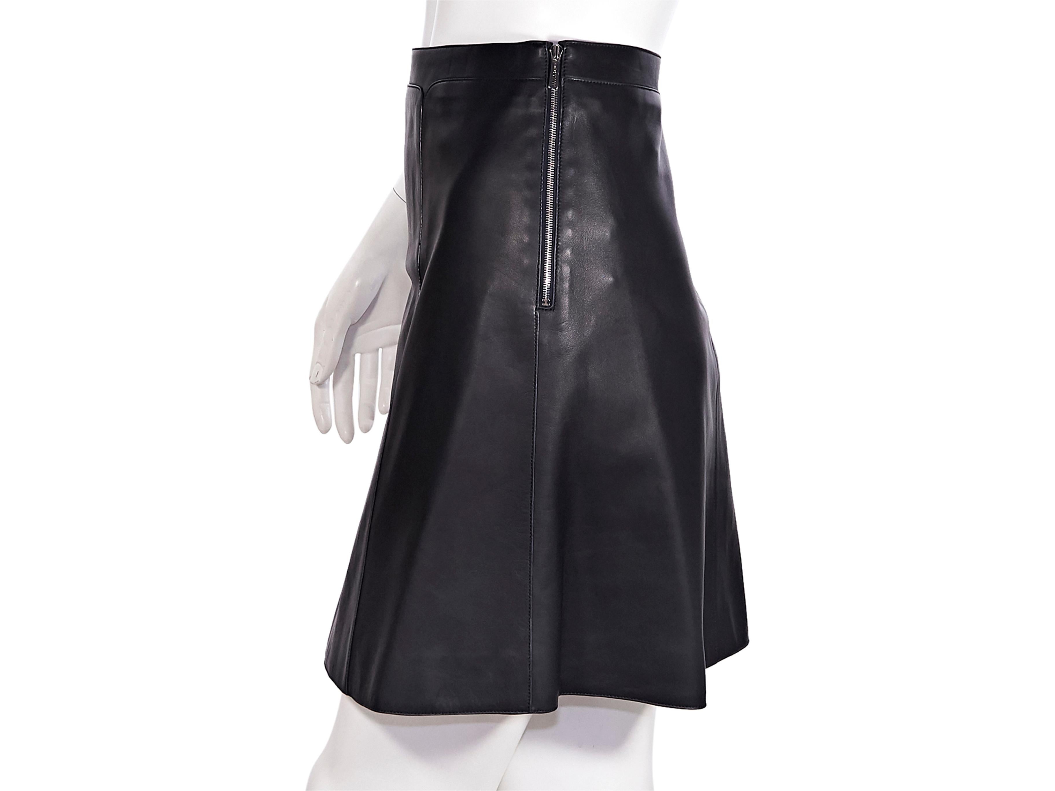 Product details:  Navy blue leather mini skirt by Hermes. High-waist. Side zip closure. Label size FR 36. 28