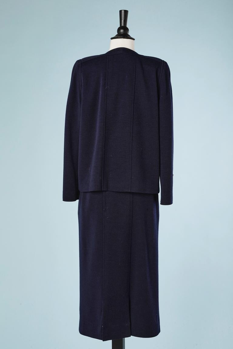 Navy blue jersey skirt suit with asymmetrical button placket Chanel Boutique  1