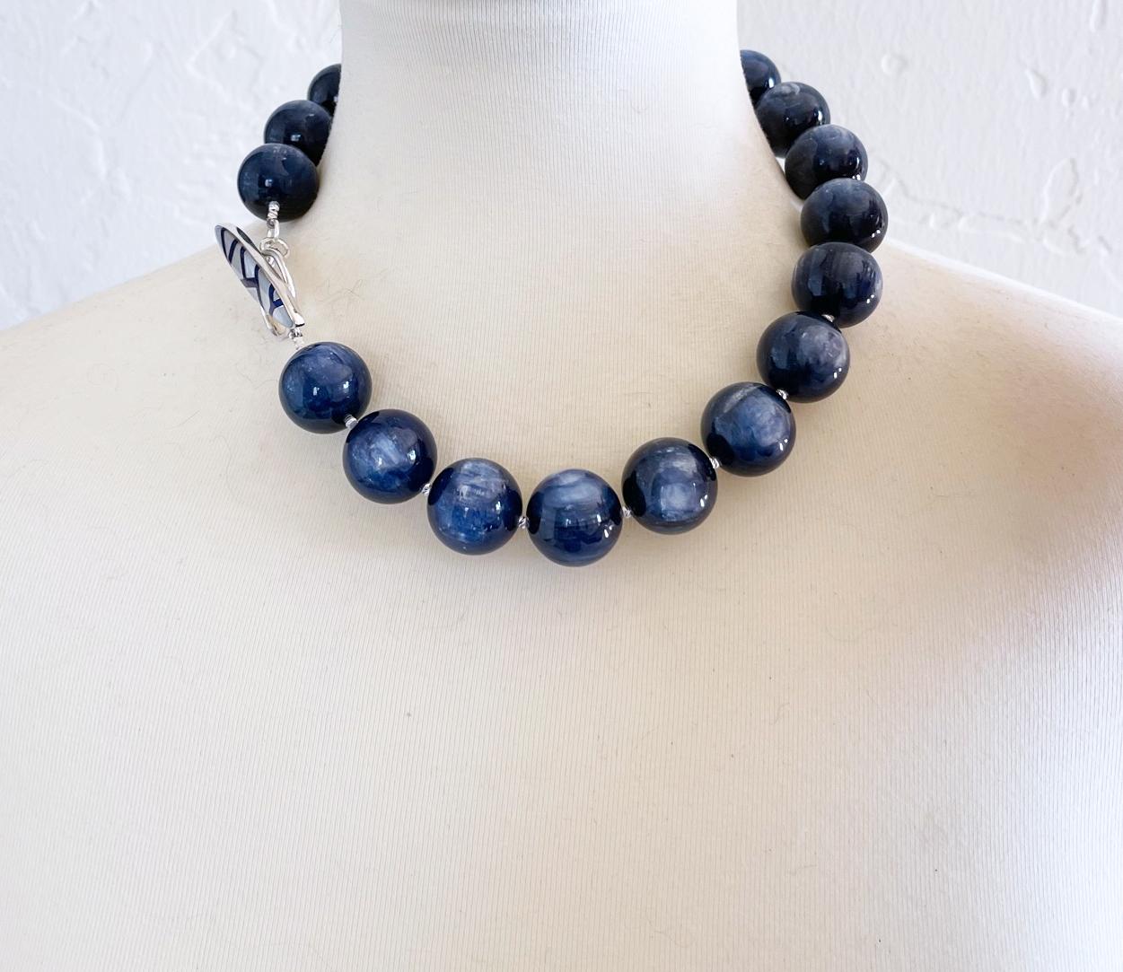 Gorgeous shimmering necklace made with superb quality 20mm round navy blue kyanite gemstone beads, sterling silver accent beads, and an elegant custom sterling toggle clasp with lapis lazuli and mother of pearl inlay. This necklace was handcrafted