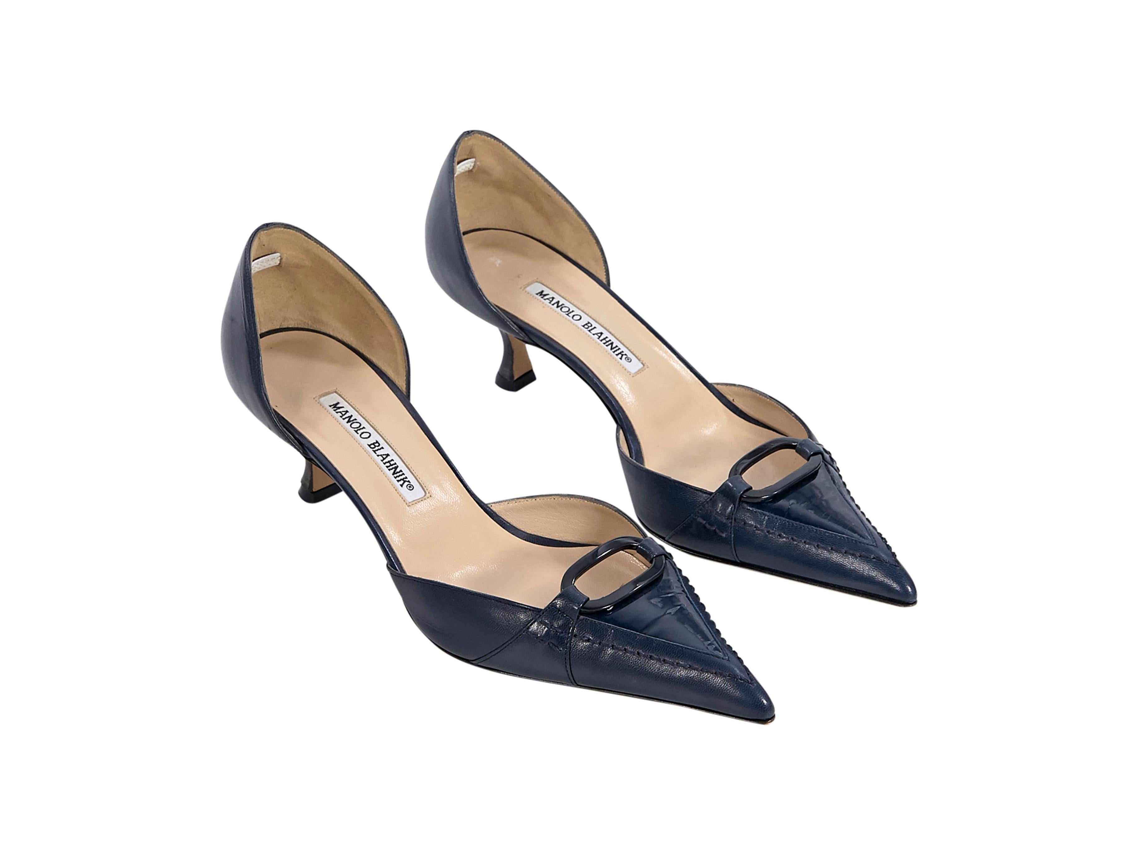Product details:  Navy blue leather d'Orsay kitten heels by Manolo Blahnik.  Trimmed with patent leather.  Point toe.  Slip-on style.  2.25