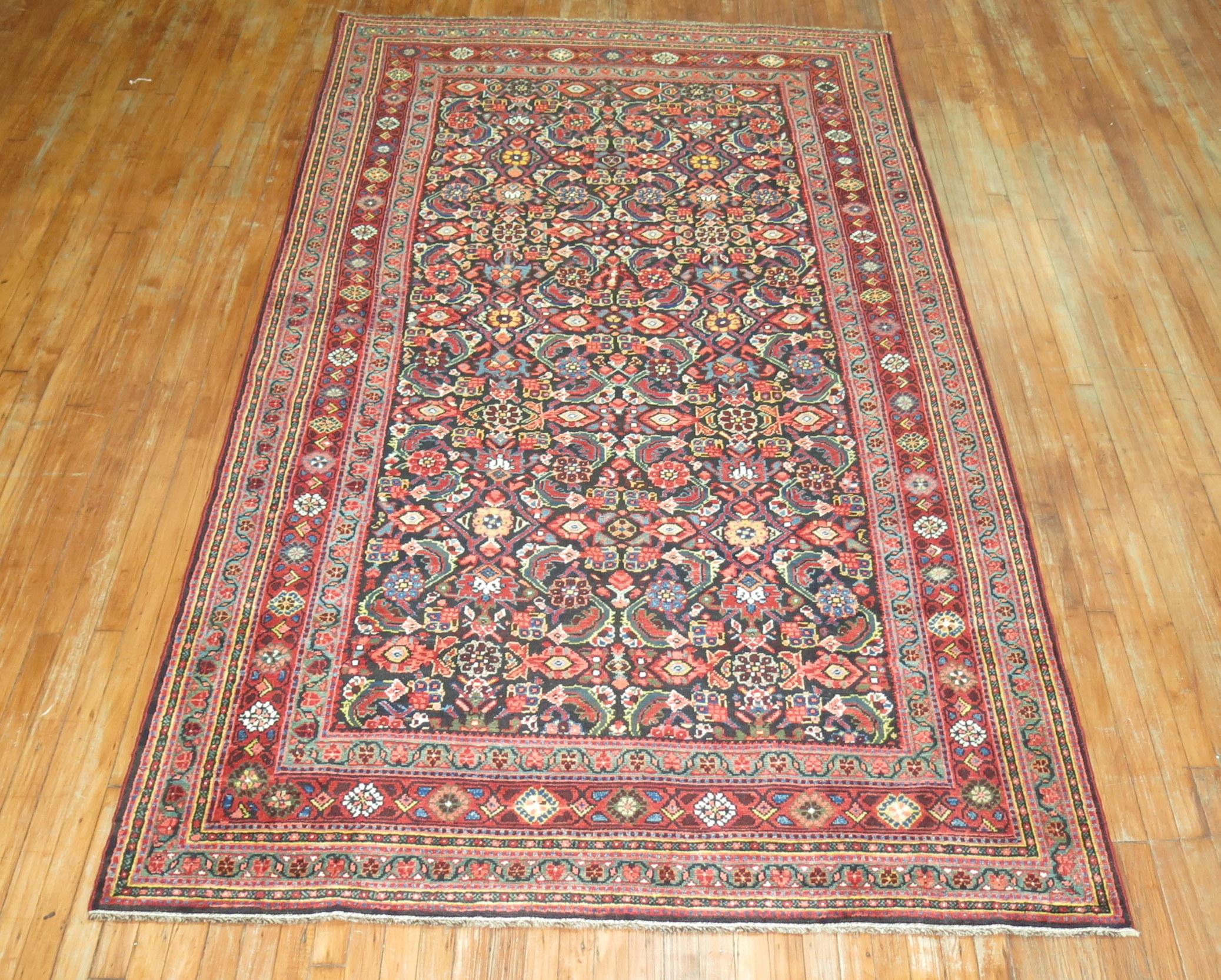 Classic Persian Ferehan featuring a navy blue background and Herati design.

5'9'' x 9'11'