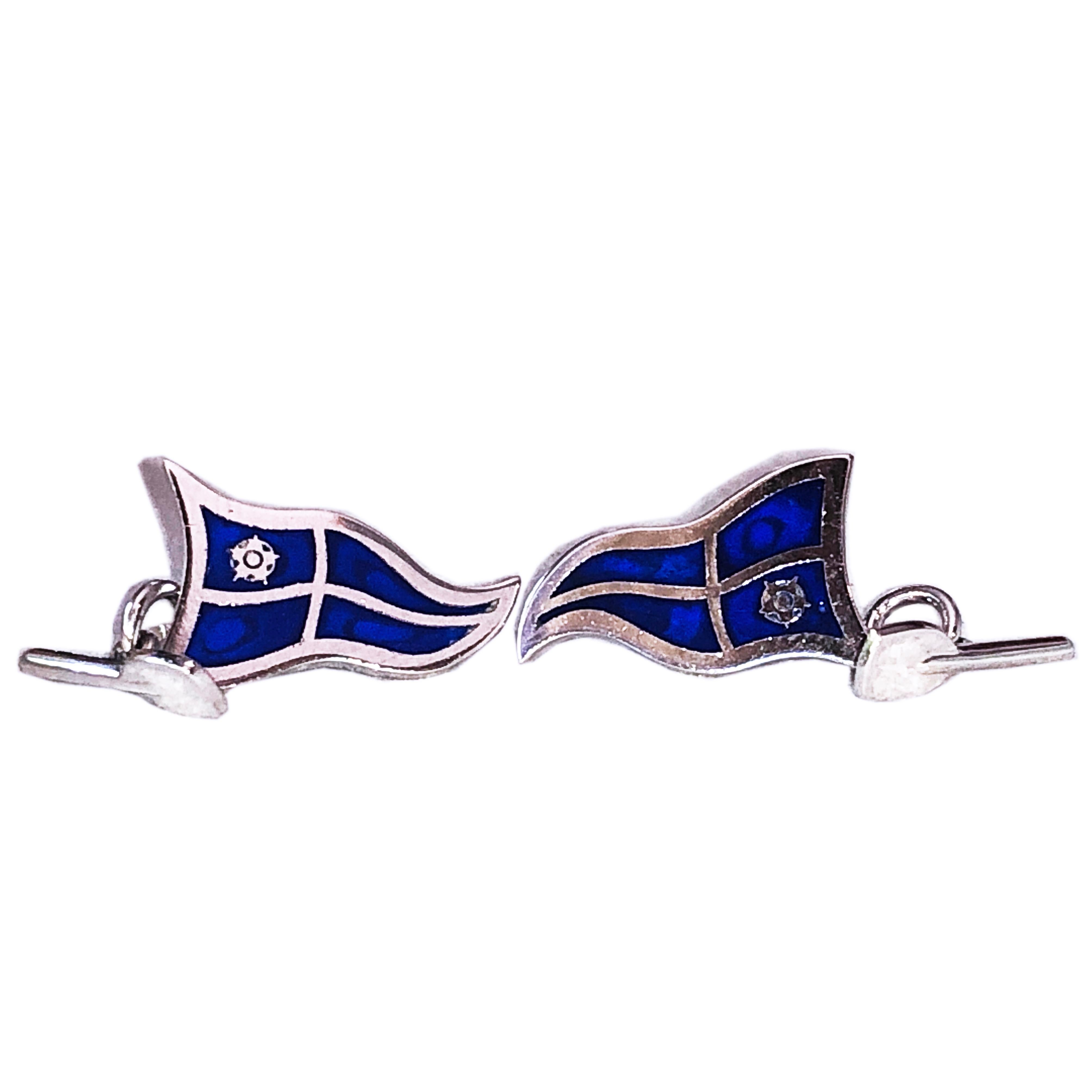 Unique, Chic yet Timeless, Navy Blue Hand Enameled Sailing Flag, Little Oar back, Sterling Silver Cufflinks.

In our smart fitted black box.