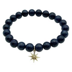 Navy Blue Sapphire 8mm Round Beaded Stretch Bracelet with Sterling Star Charm