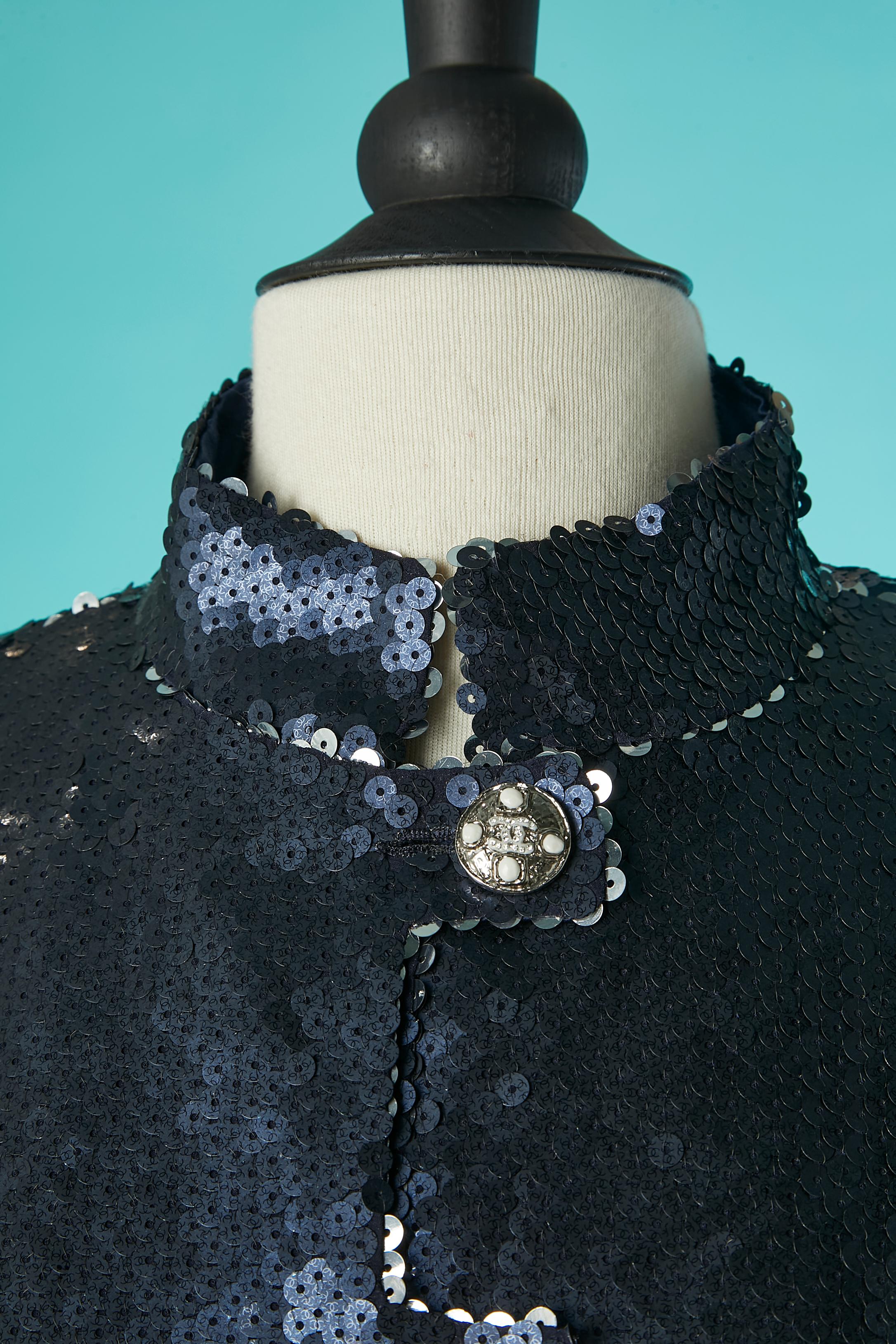 Navy blue sequin jacket with branded jewelerry button closure in the middle front + on cuffs. 
 Silk branded jacquard lining. Chain inside in the bottom. Pocket on both side. 
Show Piece / Resort 2023 show in Monte- Carlo in 2022. Design by Virginie
