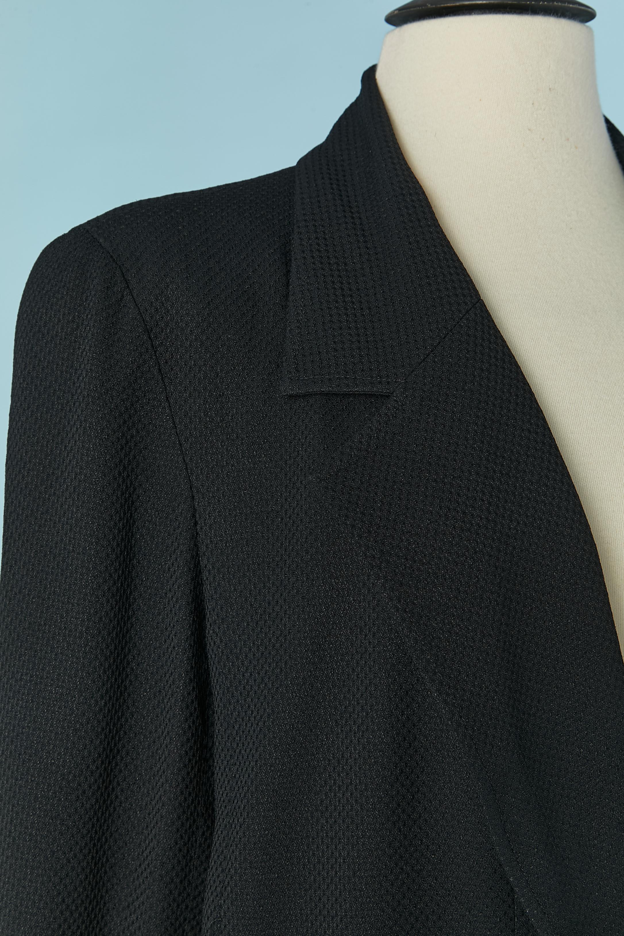 Traje-falda azul marino con chaqueta cruzada CHANEL Boutique Negro en venta