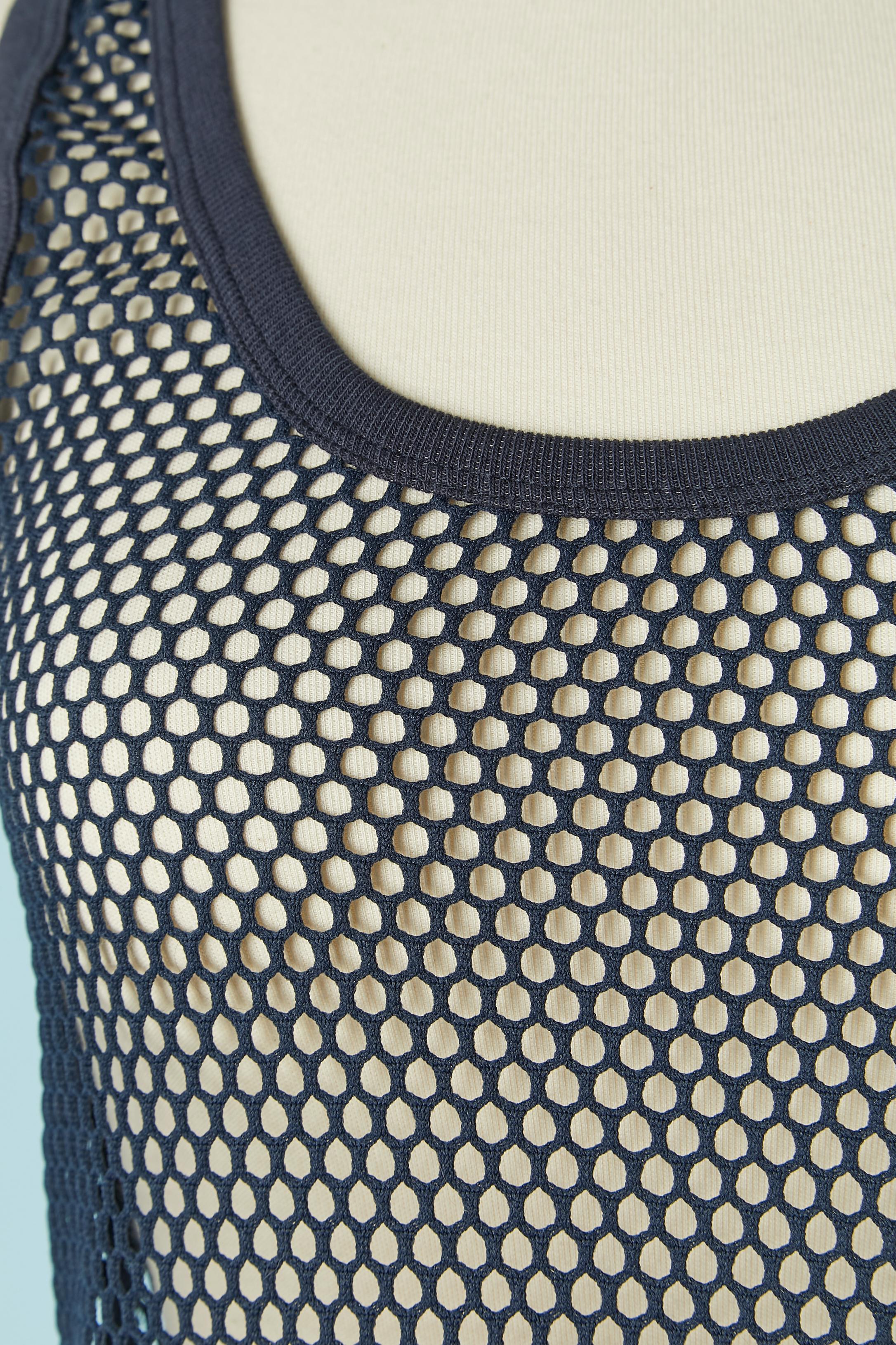 Navy blue tank top dress in mesh. Fabric composition: 100% polyester. New with tag . Authenticity hologram. Branded on the top middle back. 
SIZE M (US) L (EU) 40 (Fr) 