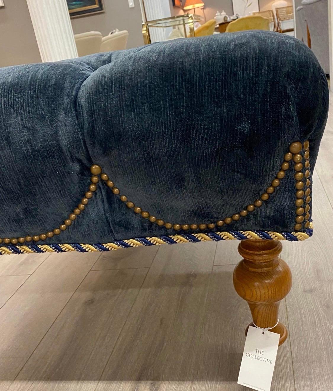 tufted blue ottoman