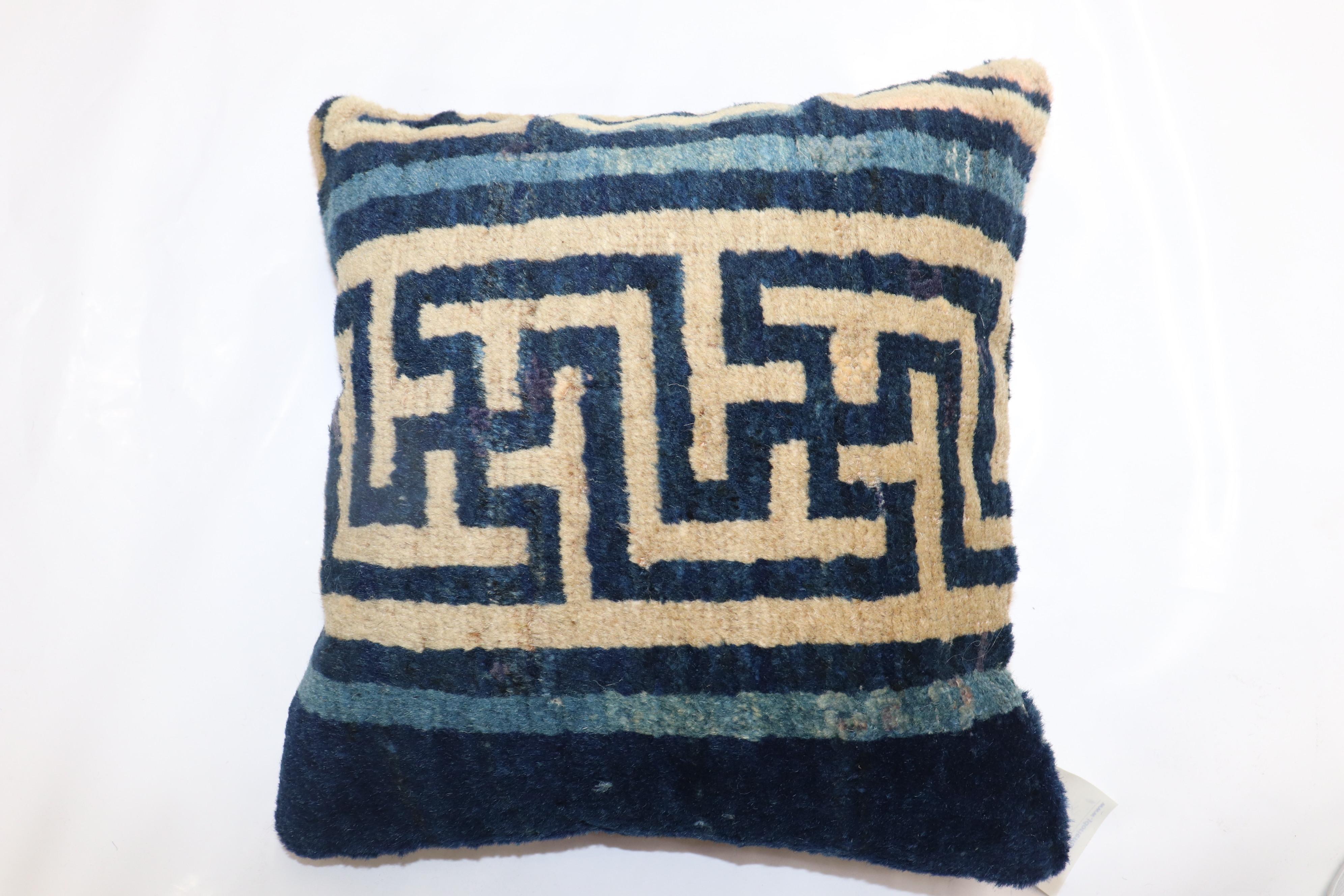 Pillow made from a 20th-century Chinese rug with zipper closure and poly-fill.

Measures: 15'' x 15''.