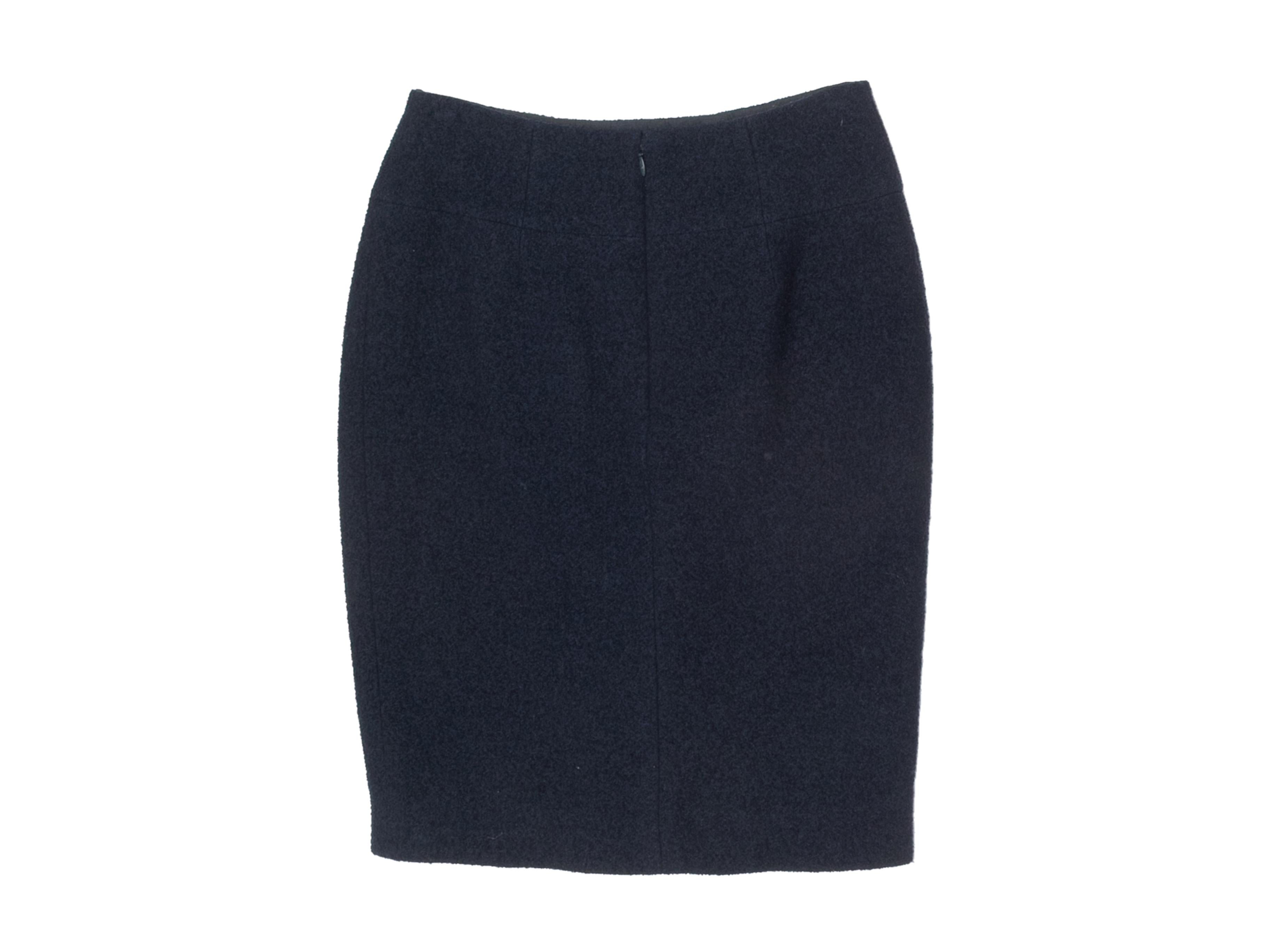 Navy wool pencil skirt by Chanel. From the Fall/Winter 2008 Collection. Zip closure at back. 26