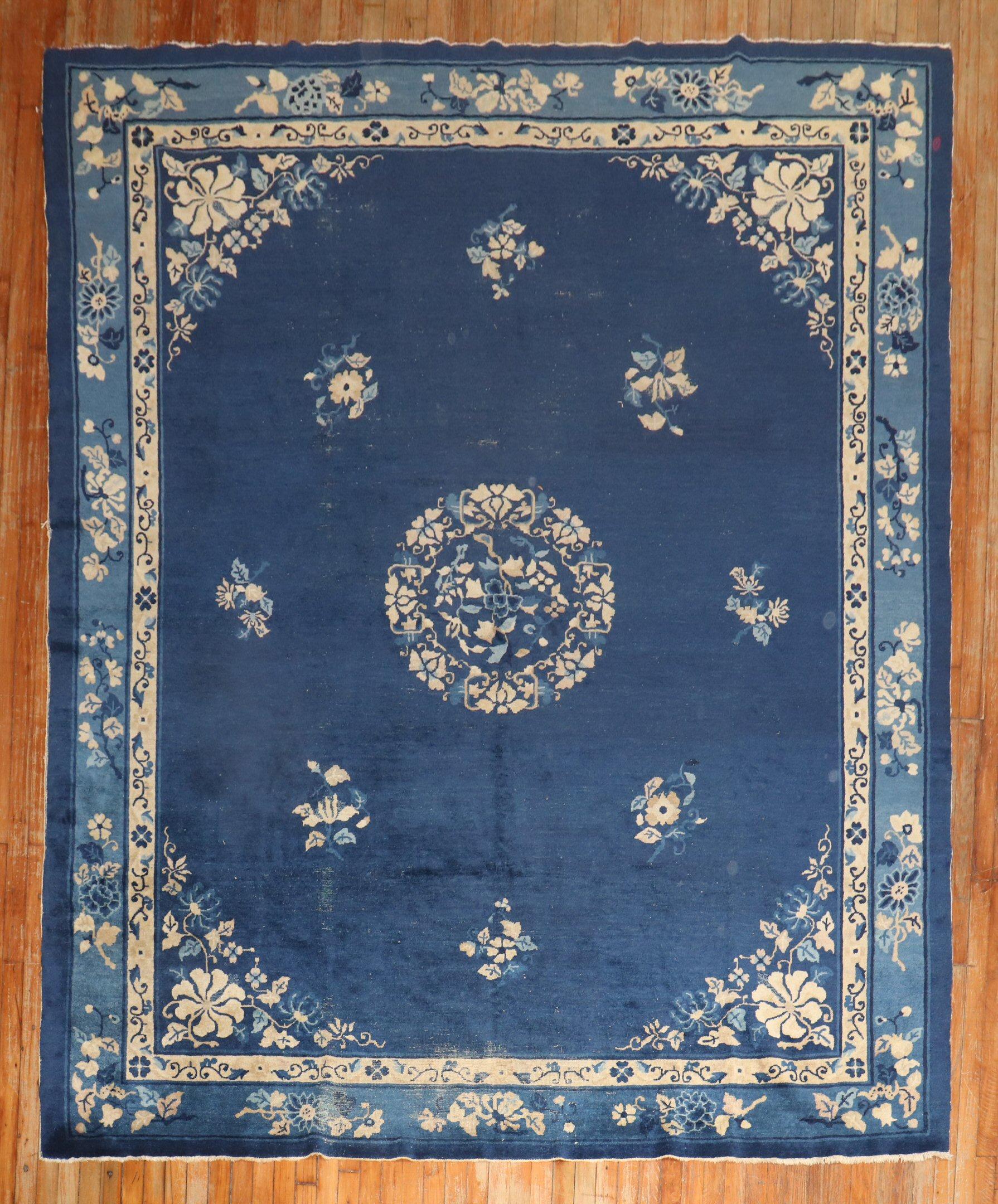 
A 2nd quarter of the 20th century blue Chinese Peking worn rug

Measures: 8' x 9'7