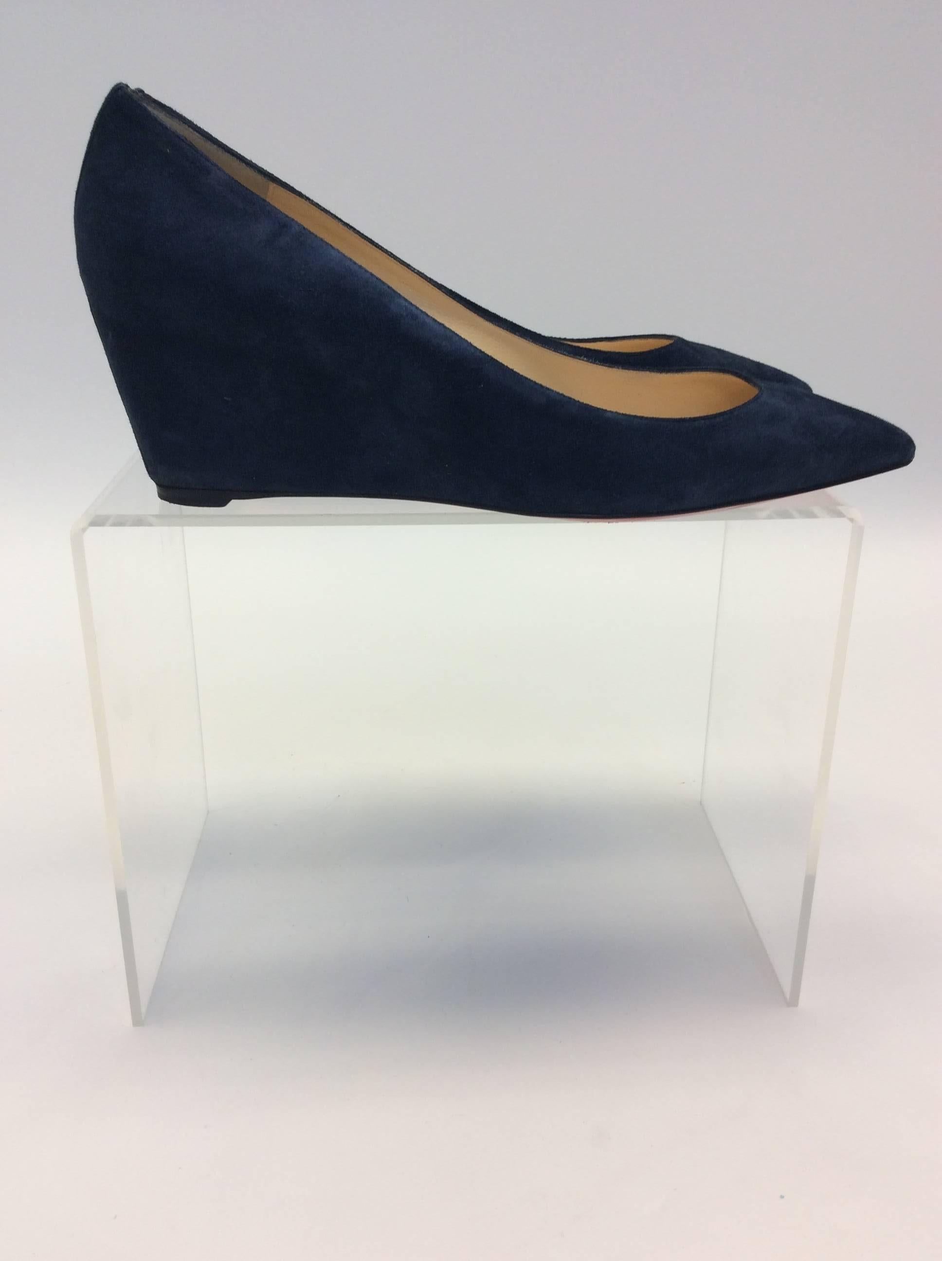 Navy Christian Louboutin Suede Wedge 
$399
Size 40.5
Suede material, almond style toe

