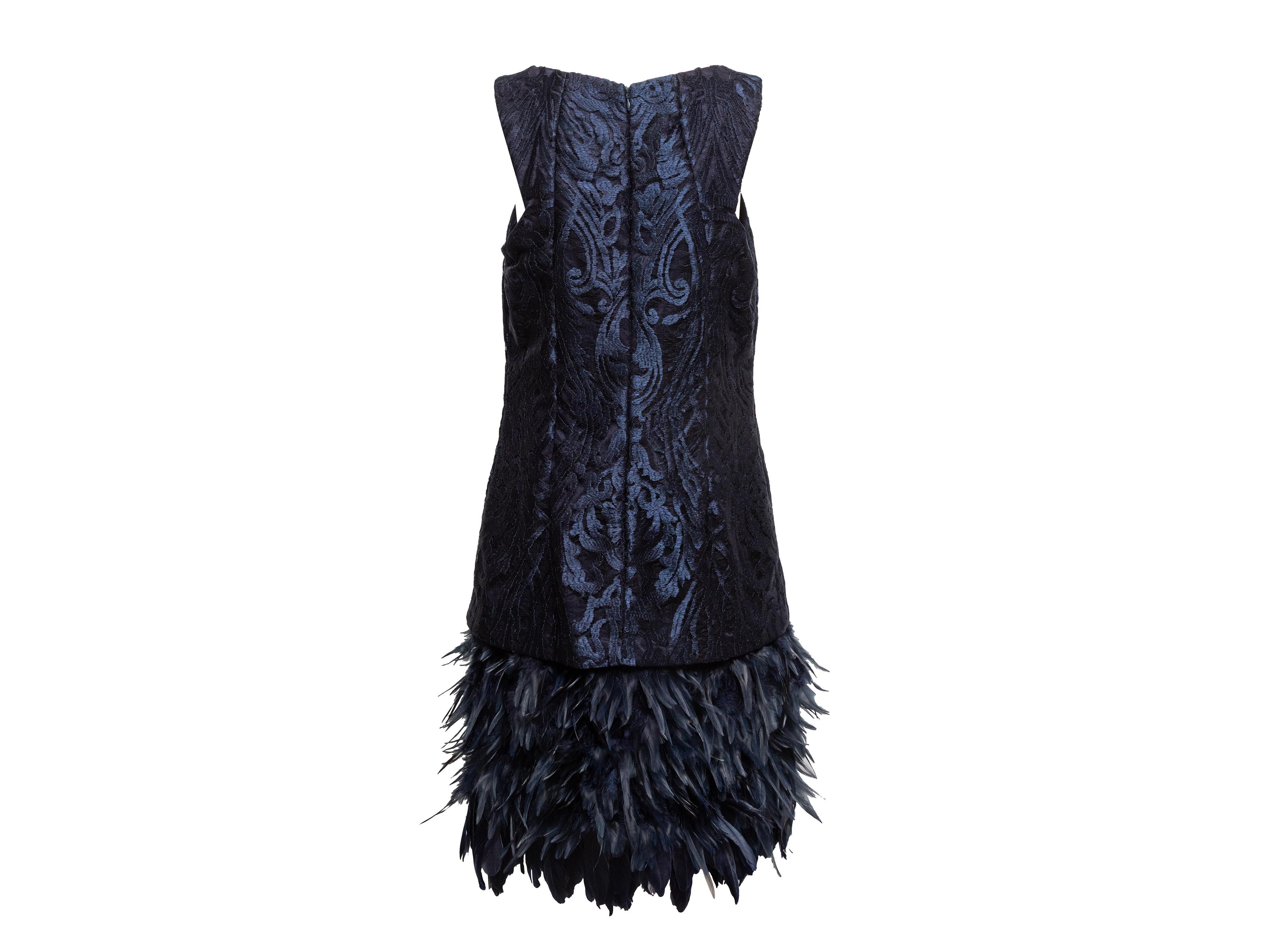 Navy sleeveless jacquard dress by David Meister. Scoop neckline. Feather trim at skirt. Zip closure at back. 36