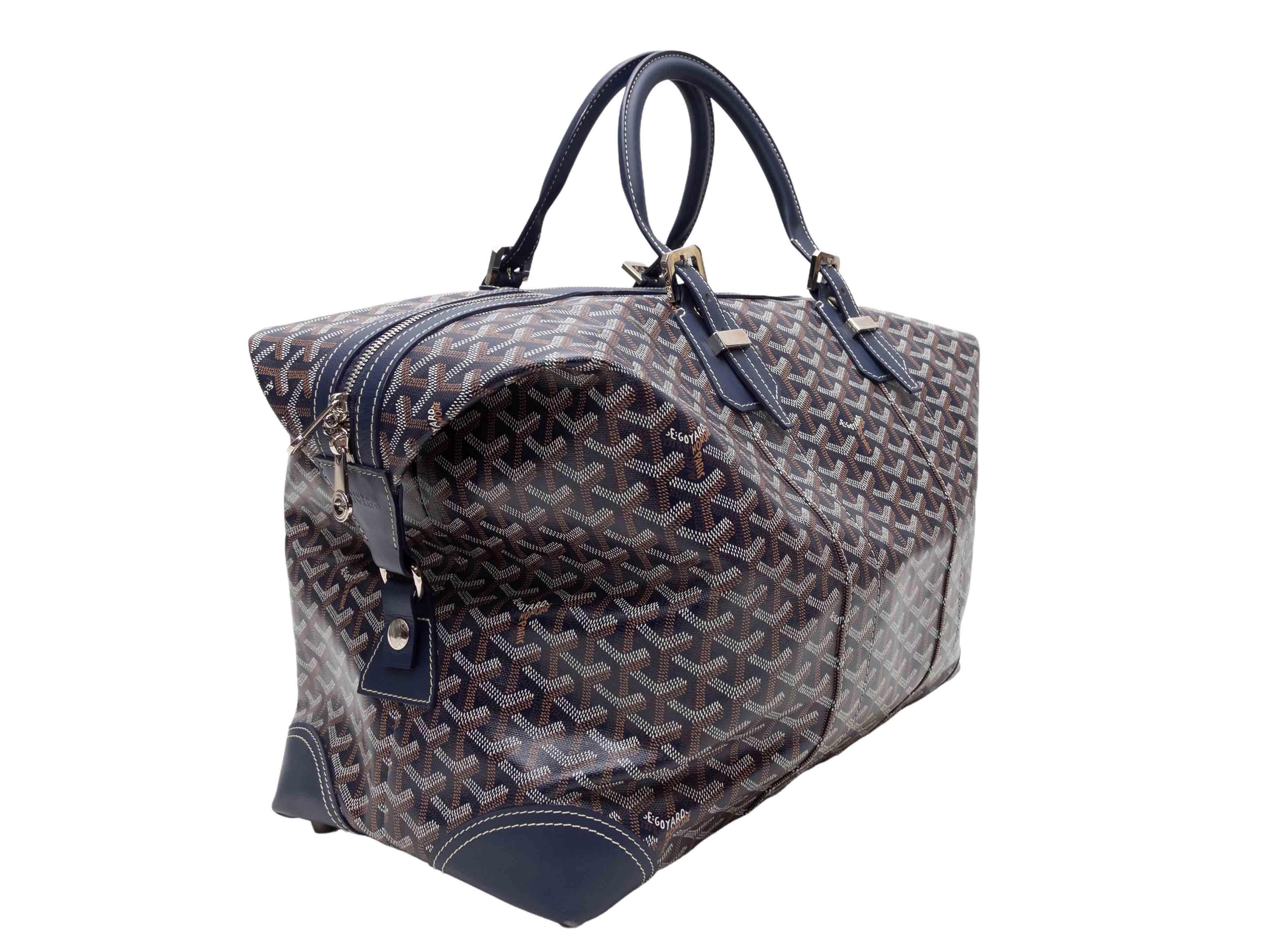 Navy Goyard Goyardine Boeing 45 Handbag. The Boeing 45 Handbag features a Goyardine body, silver-tone hardware, dual rolled top handles, and a top zip closure. 18