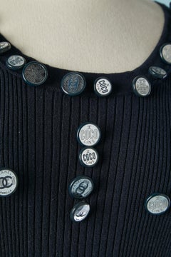Navy jersey tee-shirt with decorative buttons "Coco Line" on Chanel SS2008